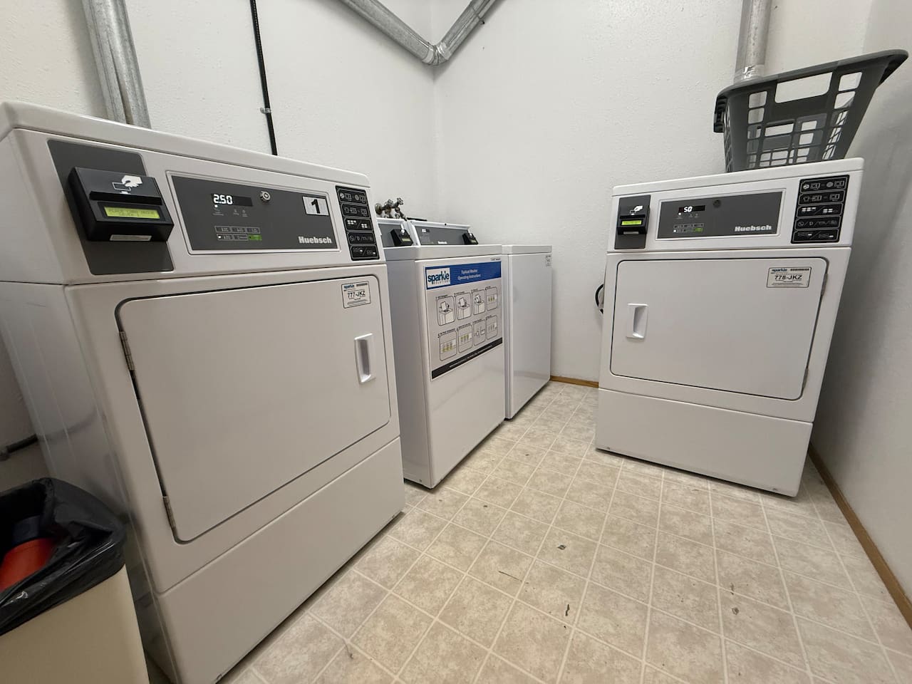 Full service washer and dryer. We provide a sparkle card to use these machines. We leave it charged with money but if it runs out before we get back, we will reimburse up to $10 so you can do two full loads.