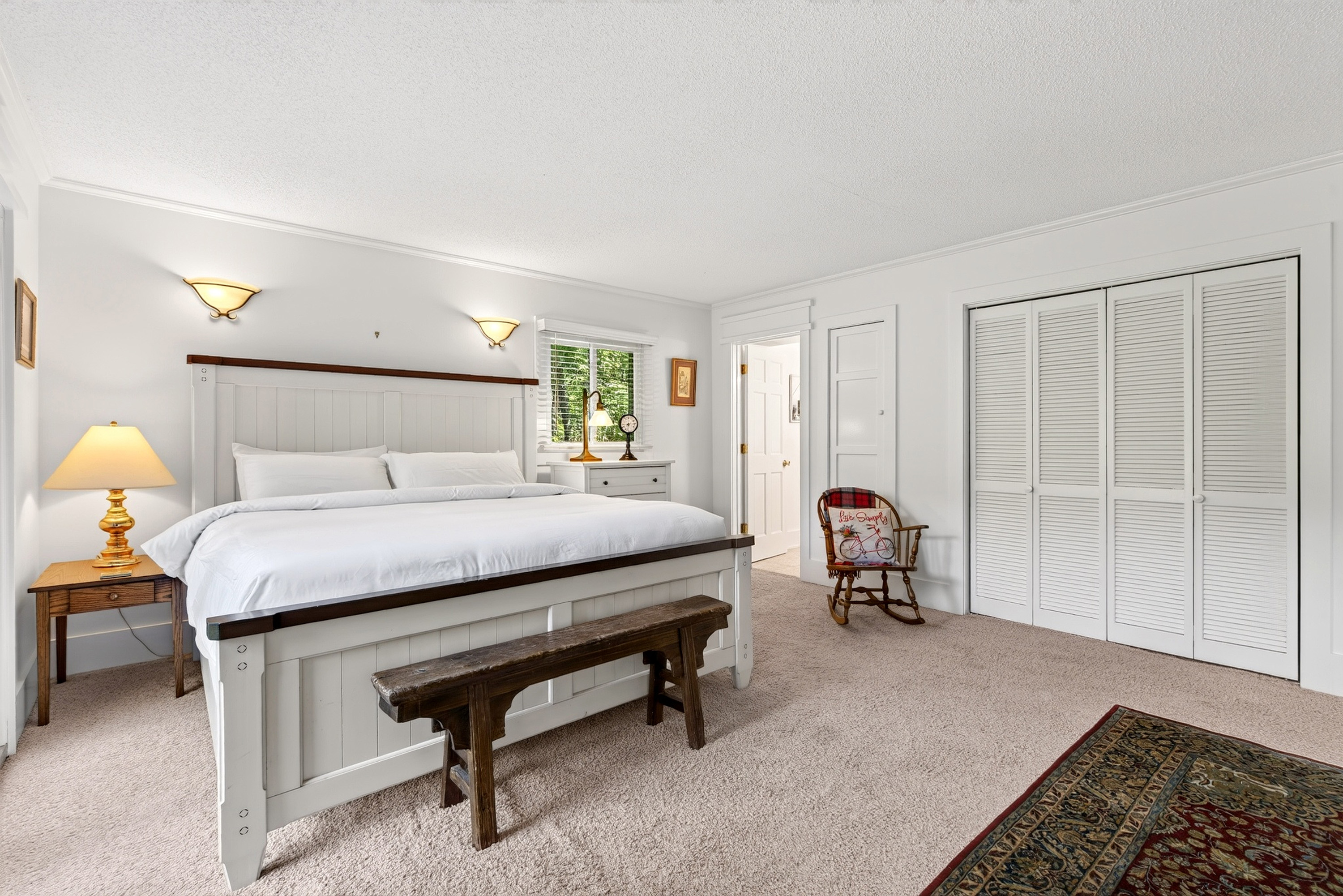 Cozy king size bed with the perfect views of the outdoors