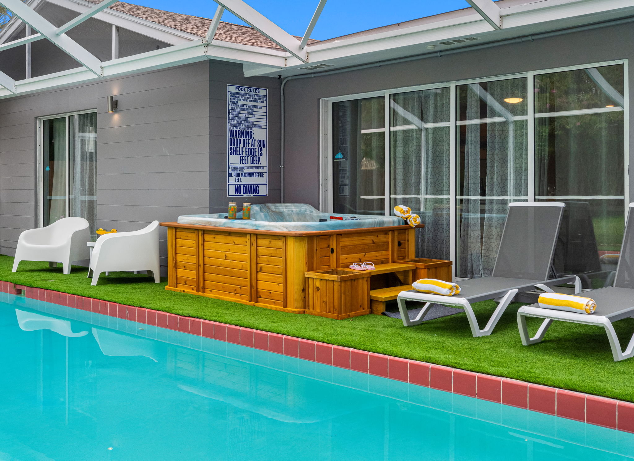 Soak your cares away in this tranquil hot tub, just steps from the pool and perfectly tucked under a screened-in lanai for year-round relaxation.