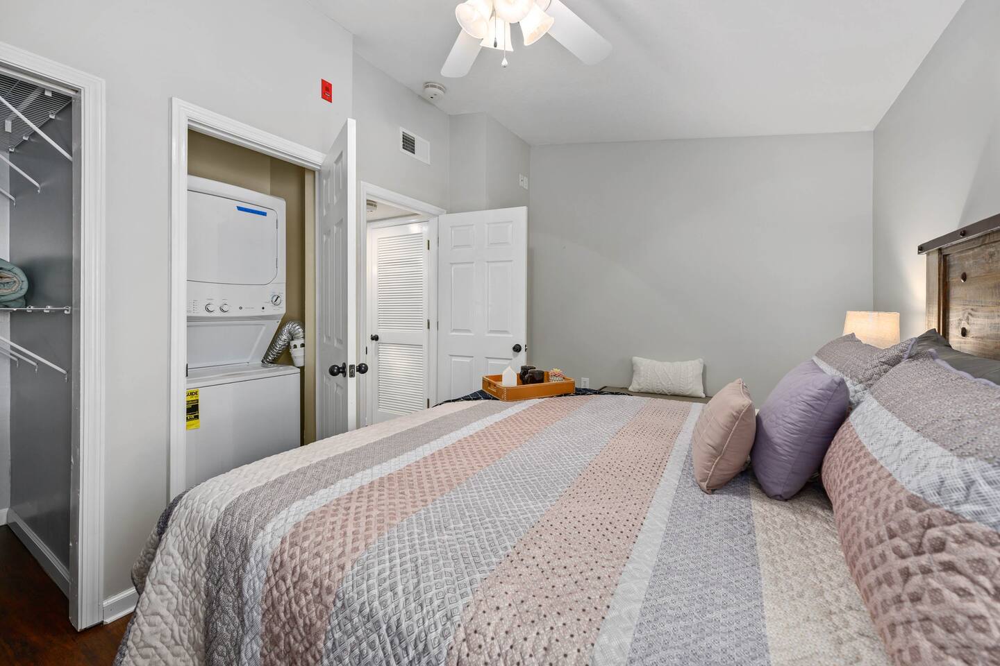 Stack/washer dryer in closetWalk in closet with pocket door (to the left)