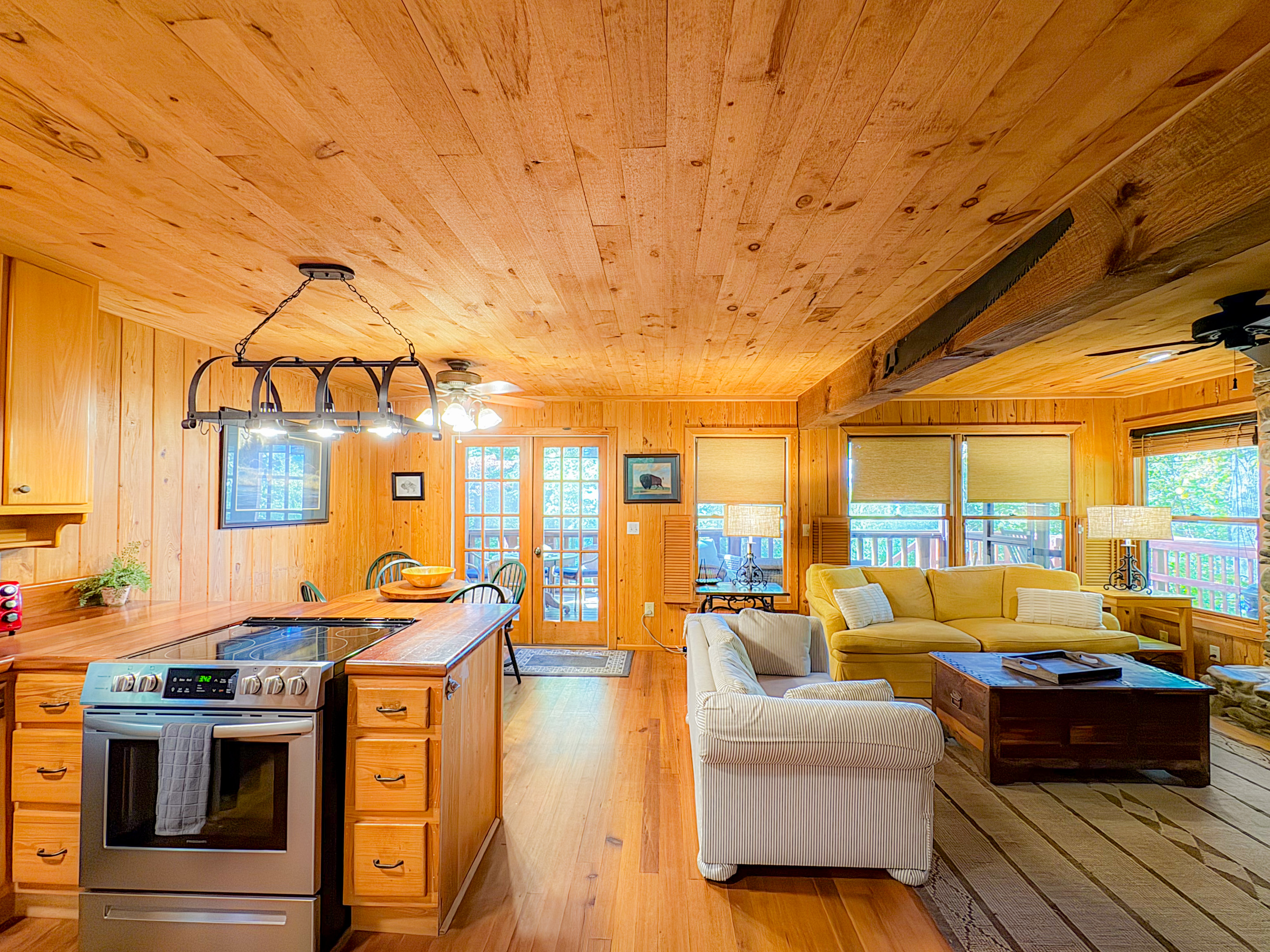 Open Concept | Fully stocked Kitchen | Dining Room table with seating for six