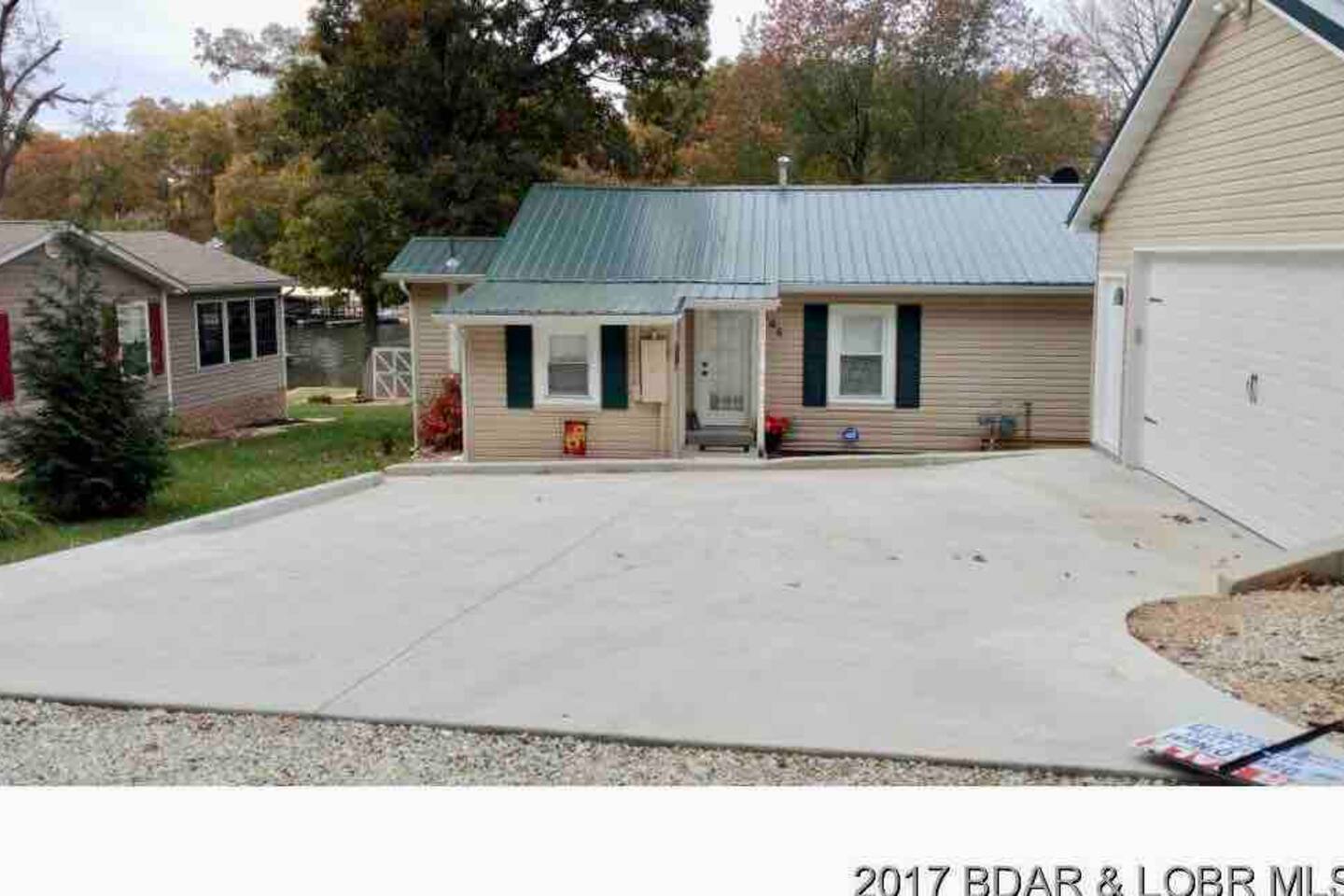 Ample parking for 2 cars on the driveway. Extra parking at end of street by community park, one house over to the left.