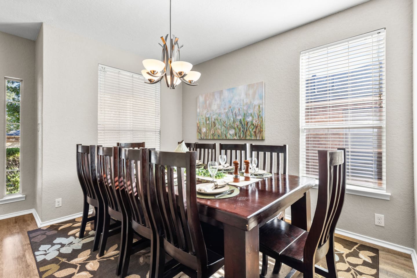 Formal dining area with seating for 10, designed for gatherings, milestone moments, and shared dining experiences.