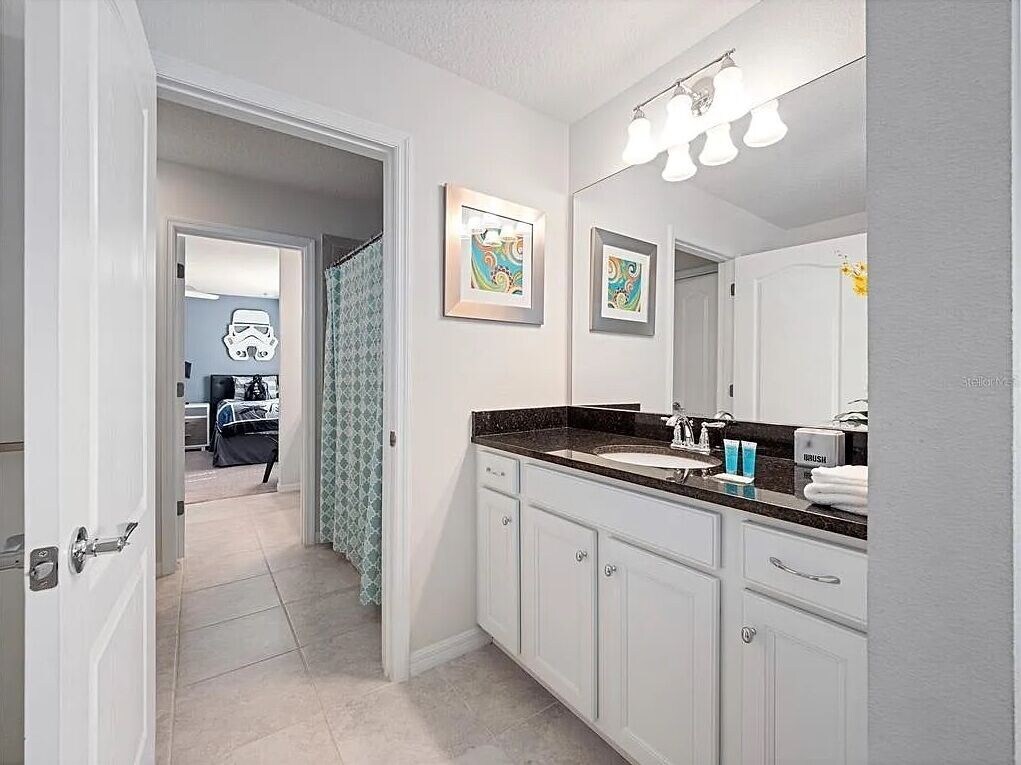 Mickey Mouse room has adjoining bath w\private sink and shared shower/toilet