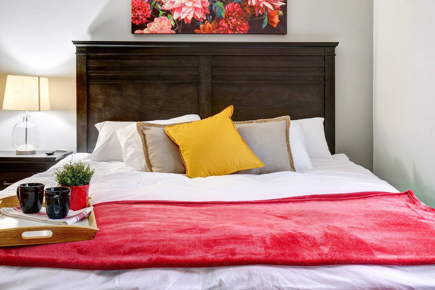 Relax in the master bedroom King bed with feather pillows