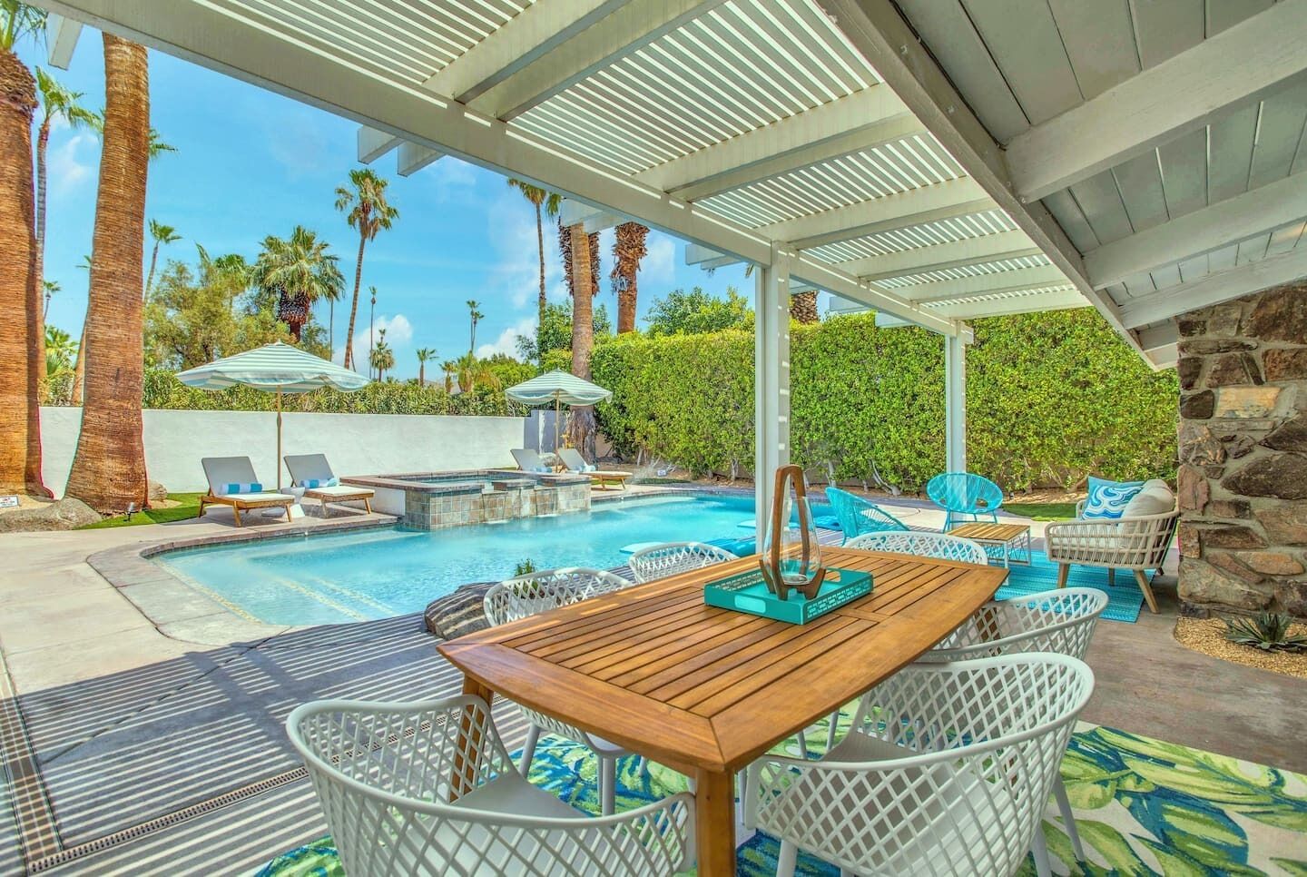 Private secluded pool with mountain and palm tree views