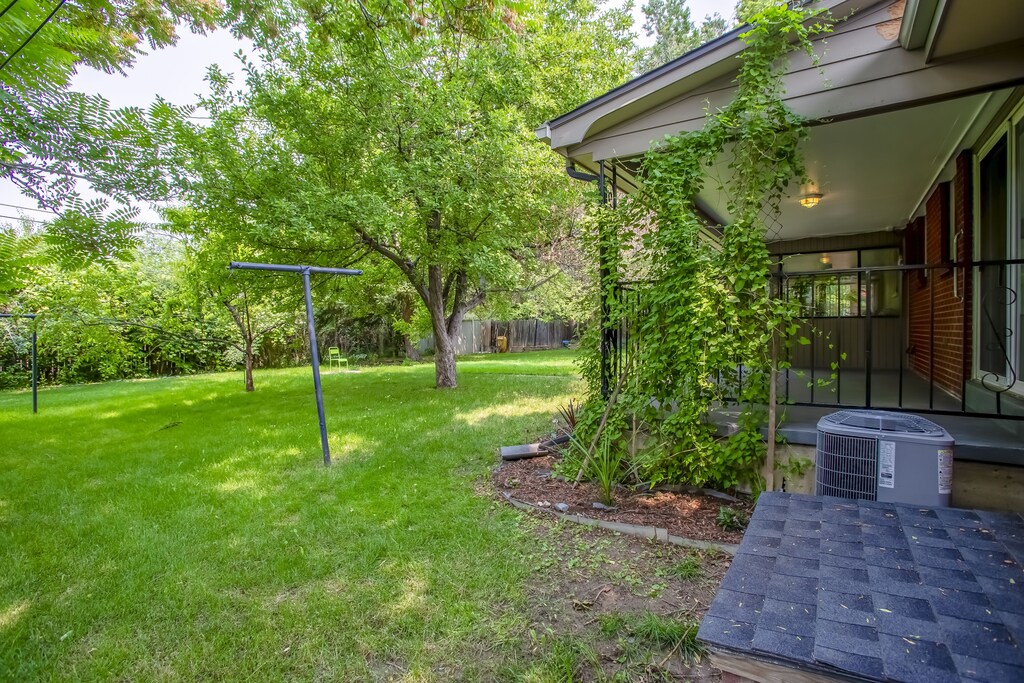 Suite 25 has a veranda (NOW WITH STRING LIGHTS) where guests can enjoy views of the yard.