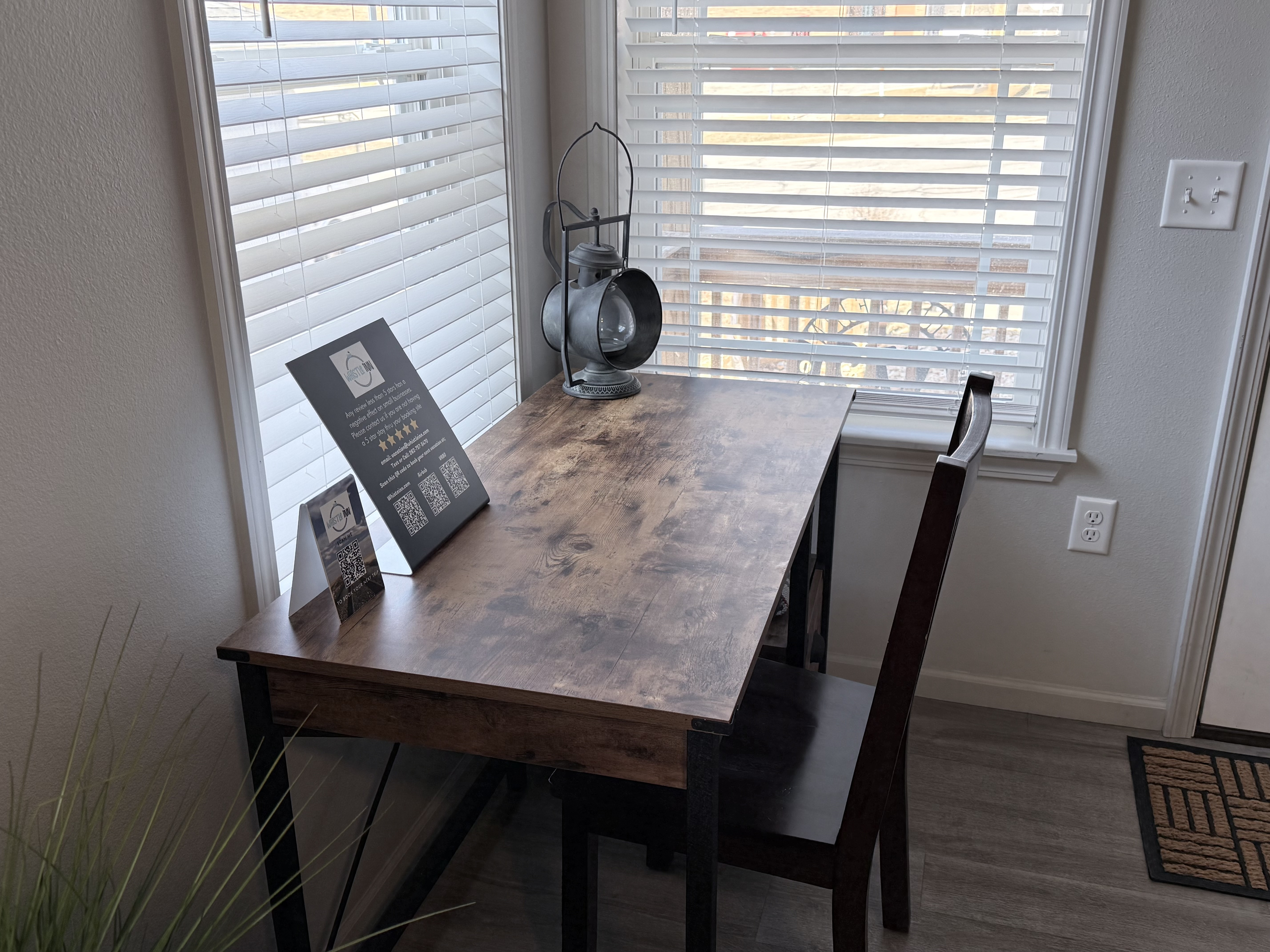 desk area with monitor