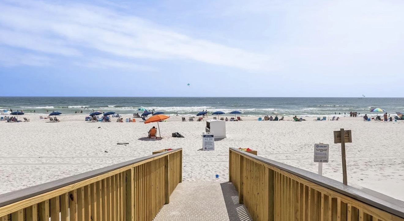 End of balcony to the white sand