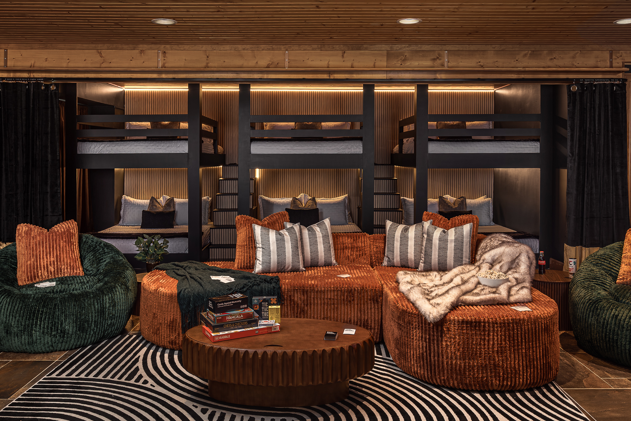 {Custom Bunk Room} Three built-in queen-over-queen bunks create an unforgettable sleeping space for kids, teens, and adults—perfect for large groups traveling together.
