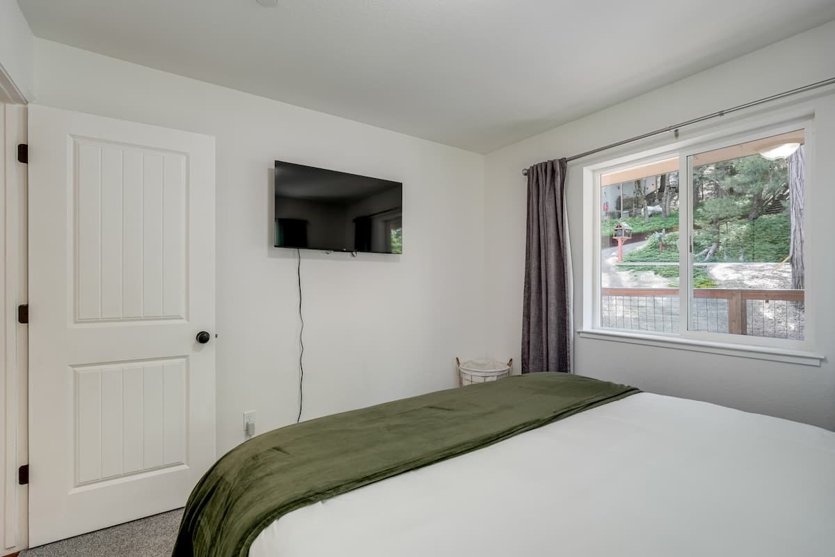 Comfortable sleeping space with TV for relaxing at night