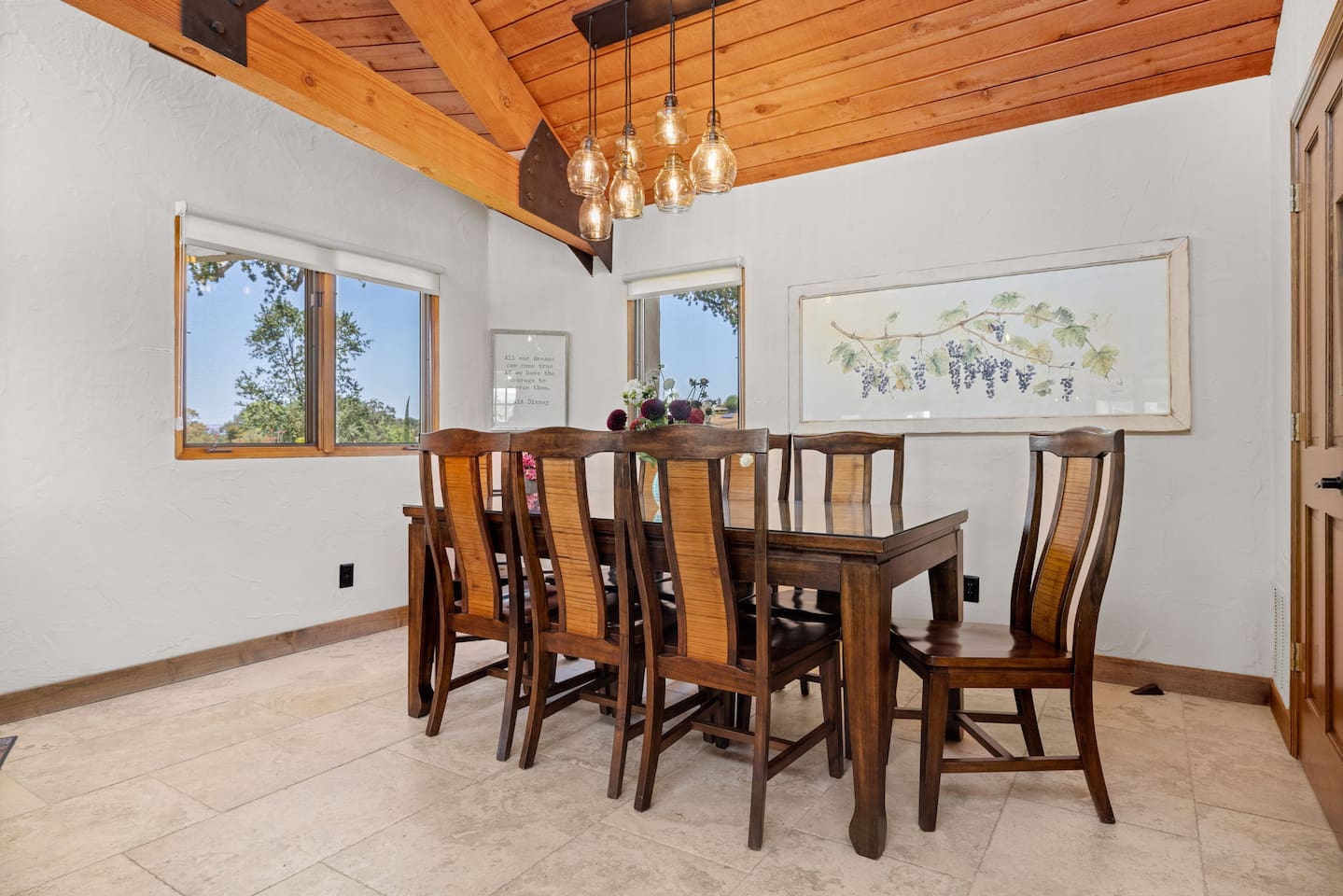Dining room table next to pantry.  A table made for stories, celebrations, and great food. Meals taste better when shared in paradise.  From quick breakfasts to long dinners.