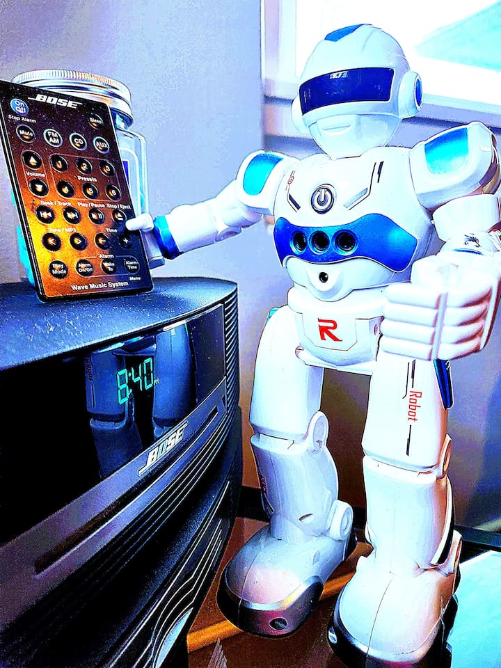 Howie selected radio stations on the Bose Wave Radio. 