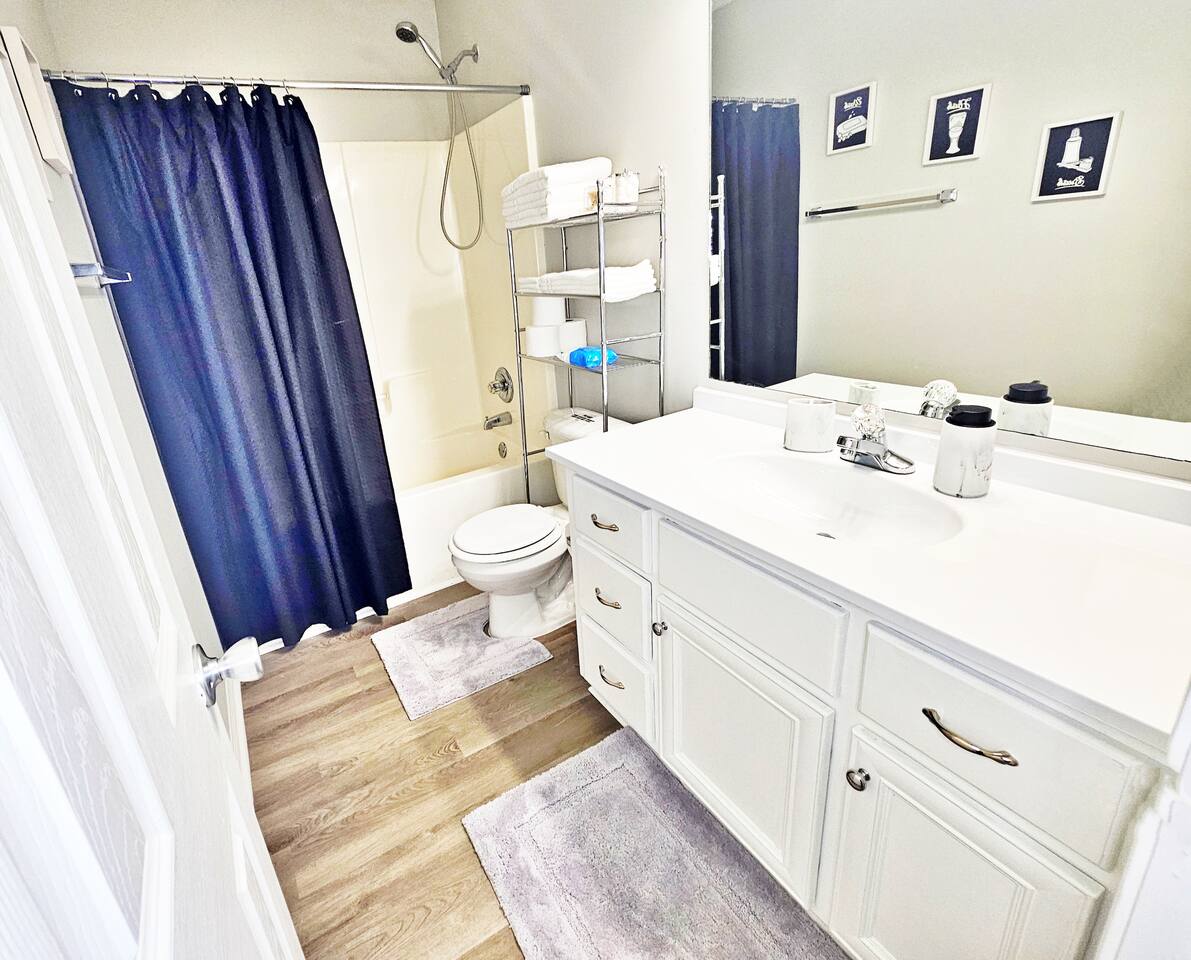 Full-sized bathroom located in the hall.  It contains all your necessities and a little extra. 
