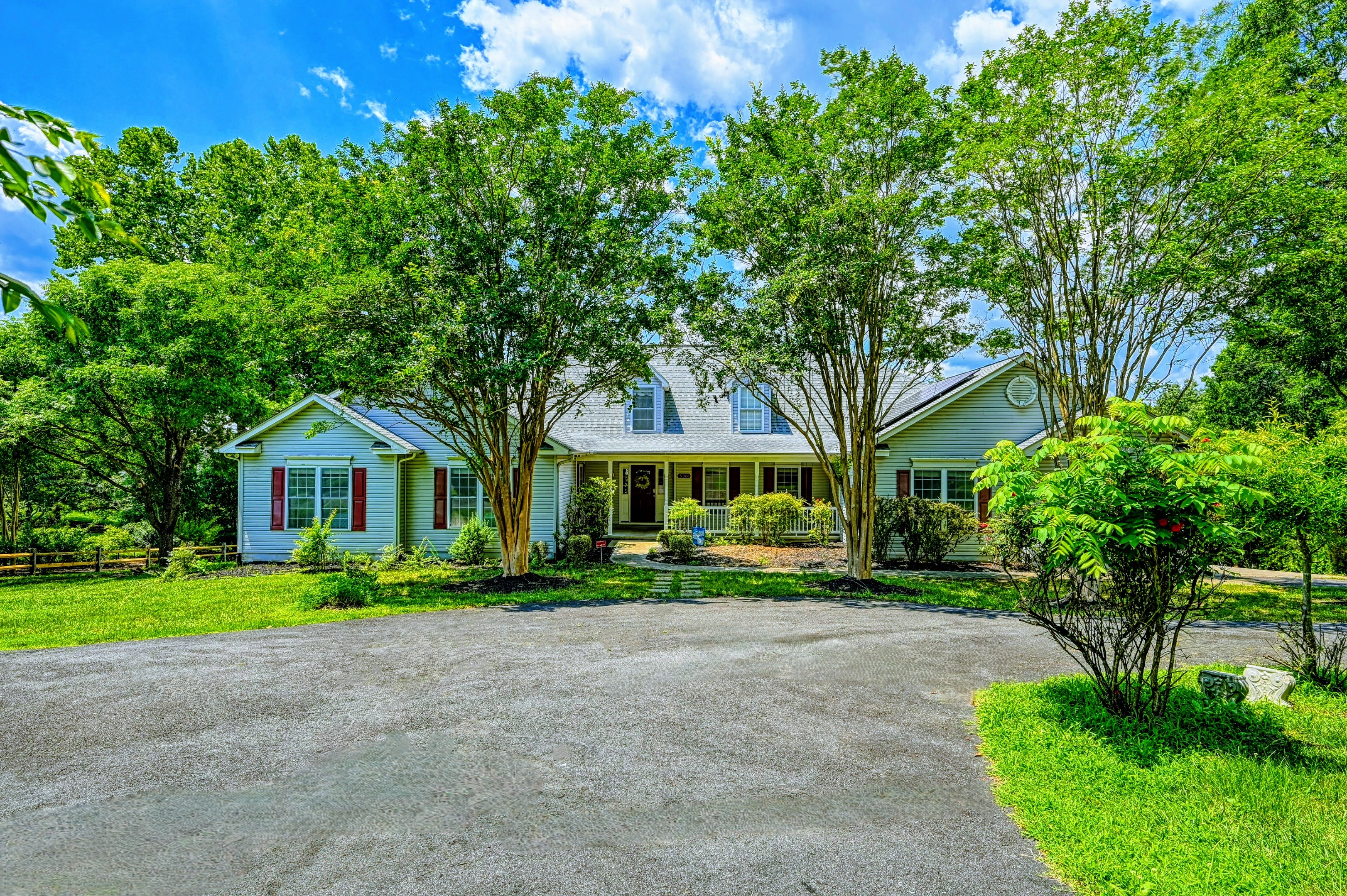 This home is huge - over 5100 square feet on three levels. Front, lots of parking, two driveways.