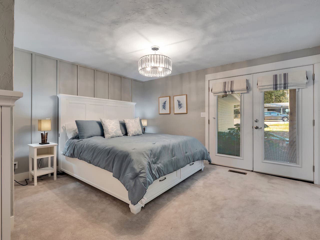 Main floor, master, king bed, tv, front porch access, en-suite bathroom