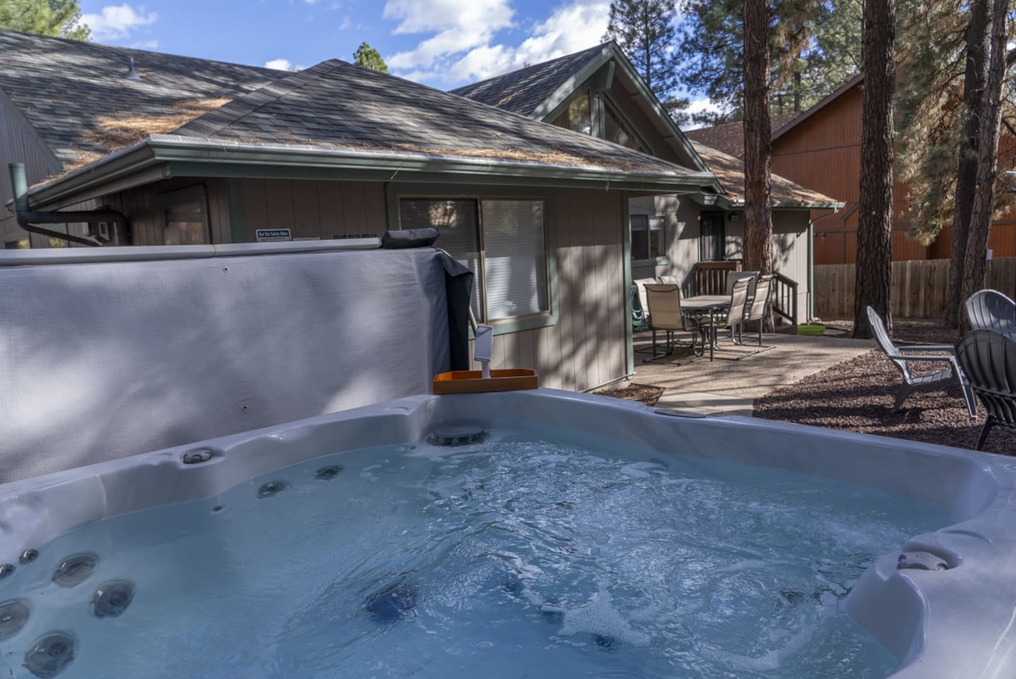 Relax in the outdoor hot tub after exploring, hiking, or spending the day around town.