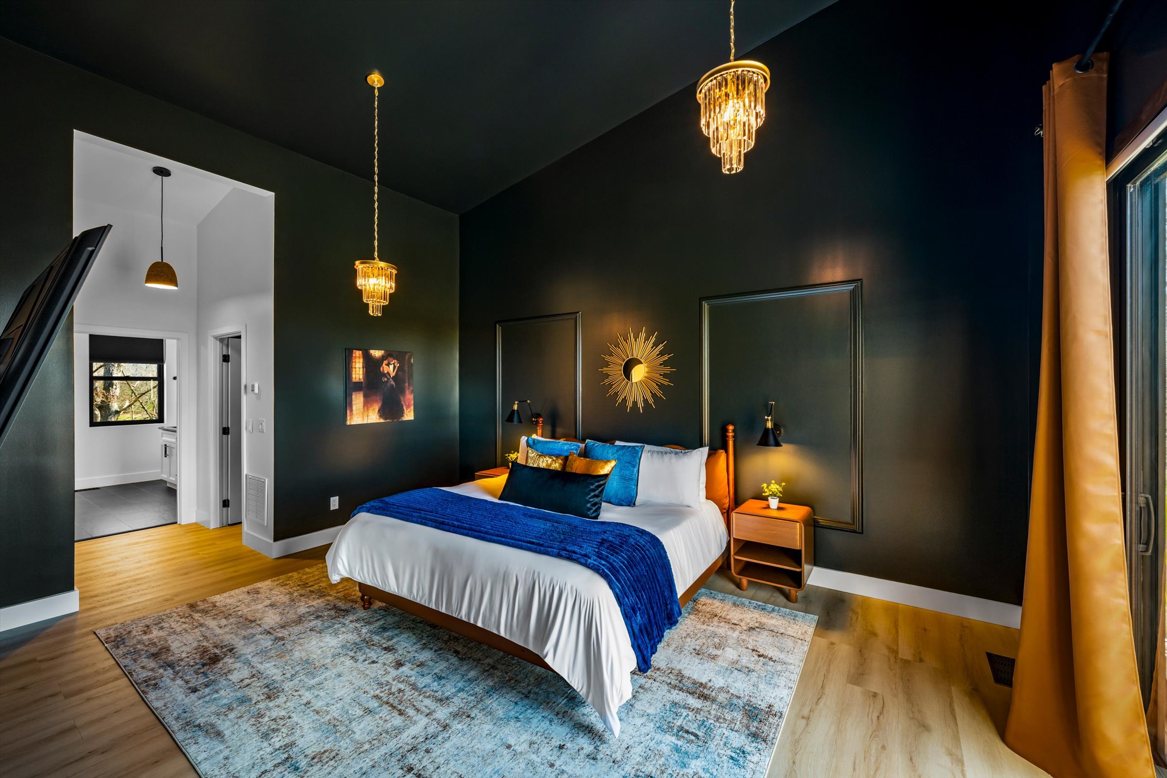 {Primary Suite}
Glamorous and moody in all the right ways — a private king suite designed to feel calm, elevated, and a little indulgent.