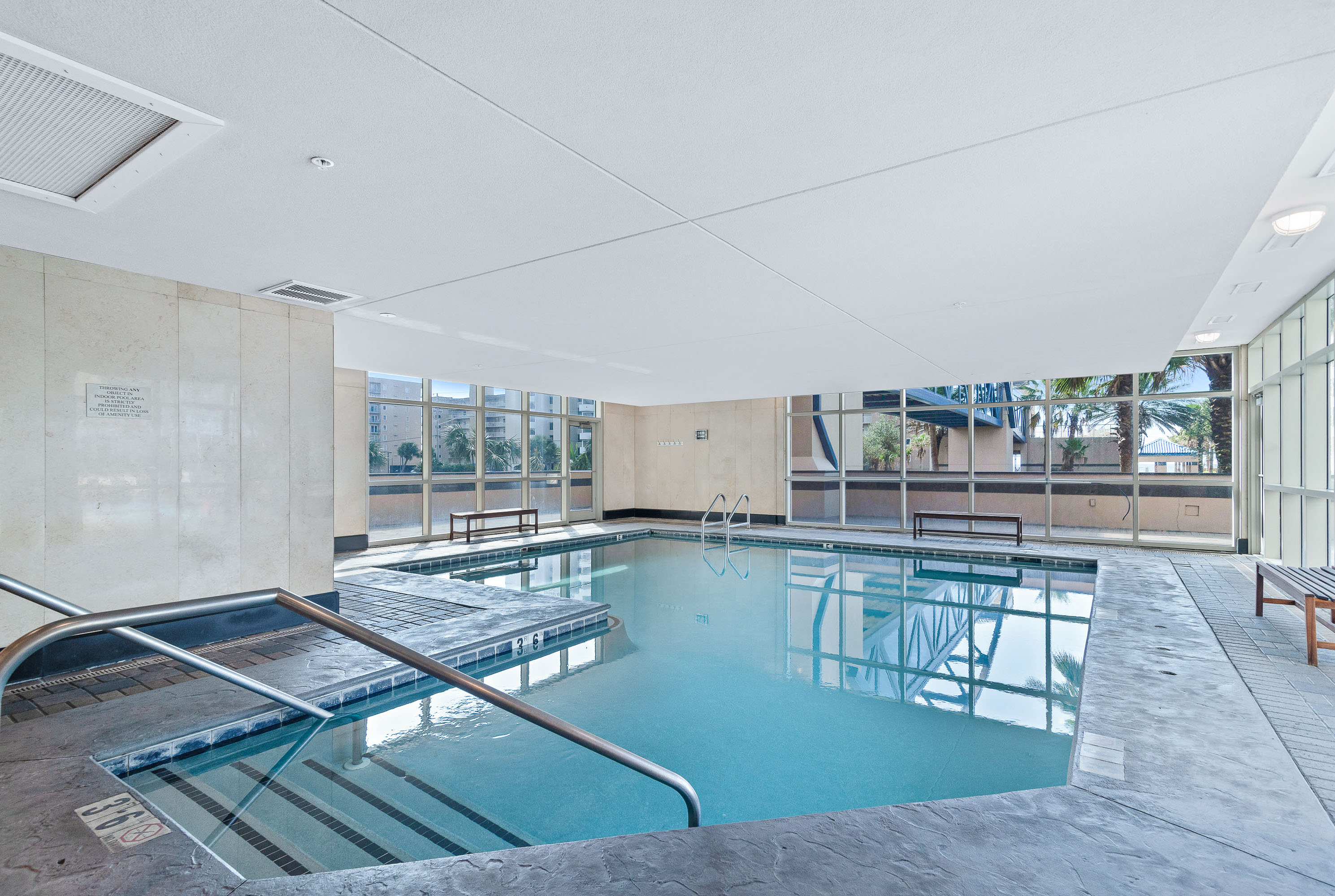 Dive into relaxation, no matter the weather. Our heated indoor pool provides a tranquil escape, featuring floor-to-ceiling windows for natural light and stunning views. The perfect place to unwind after a long day.