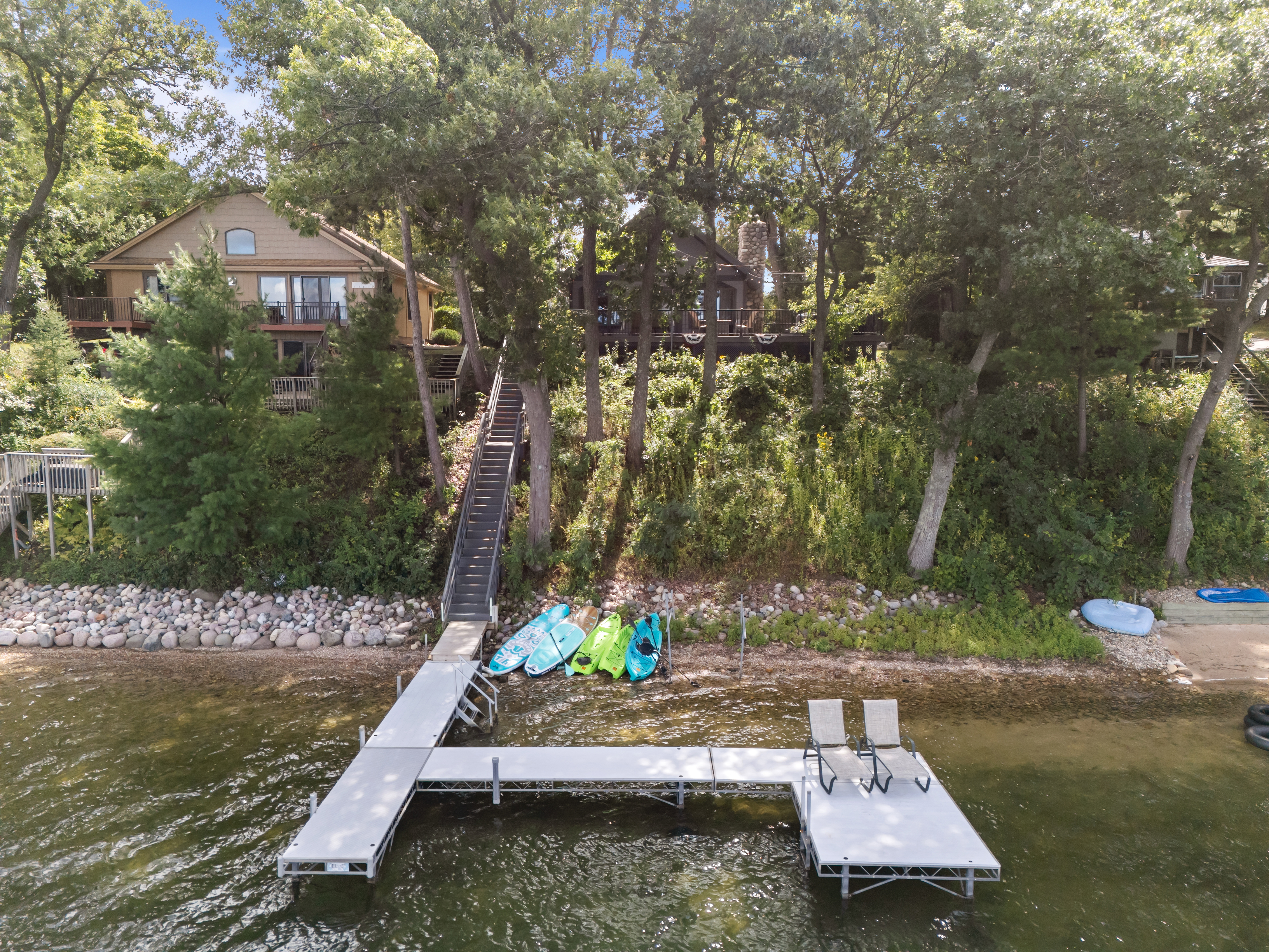The large pier not only offers space to relax but also helps define the swimming area for easy lake enjoyment.