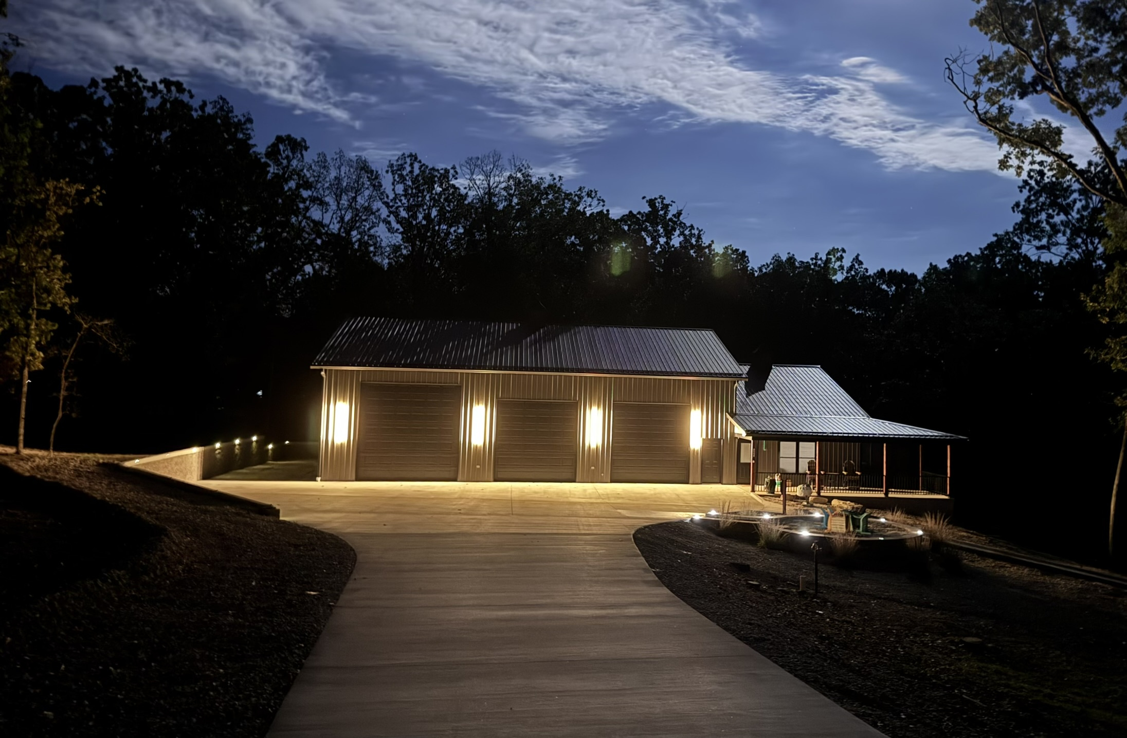Well lit driveway at night