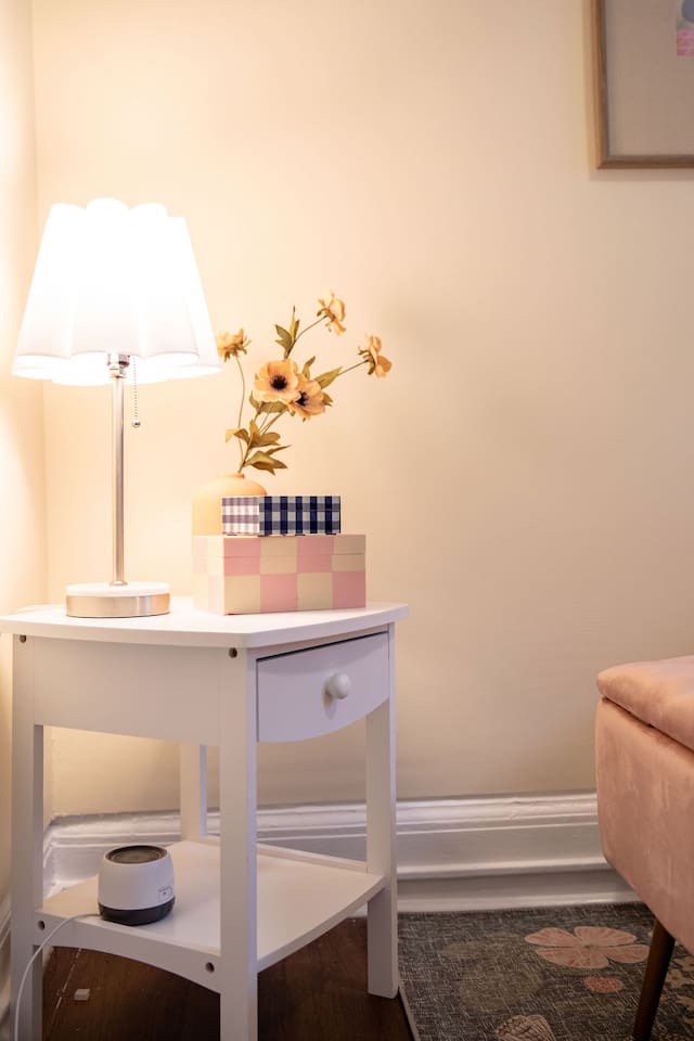 Comfortable queen-sized bedroom offering a restful retreat with ample space and natural light.