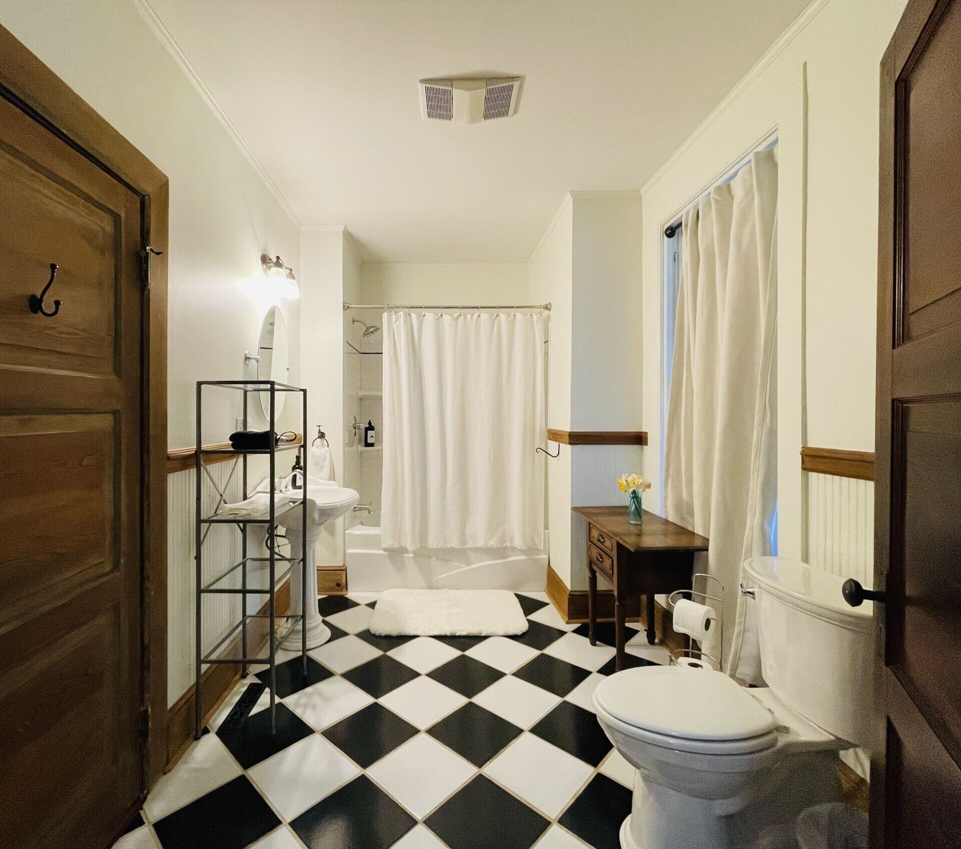 Downstairs bathroom that has a tub/shower combo
