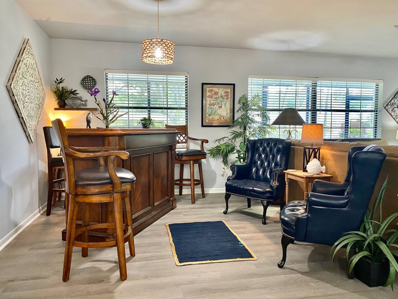 Bar and lounge area in the living room to enjoy a night cap or just have meaningful conversation in this inviting space.