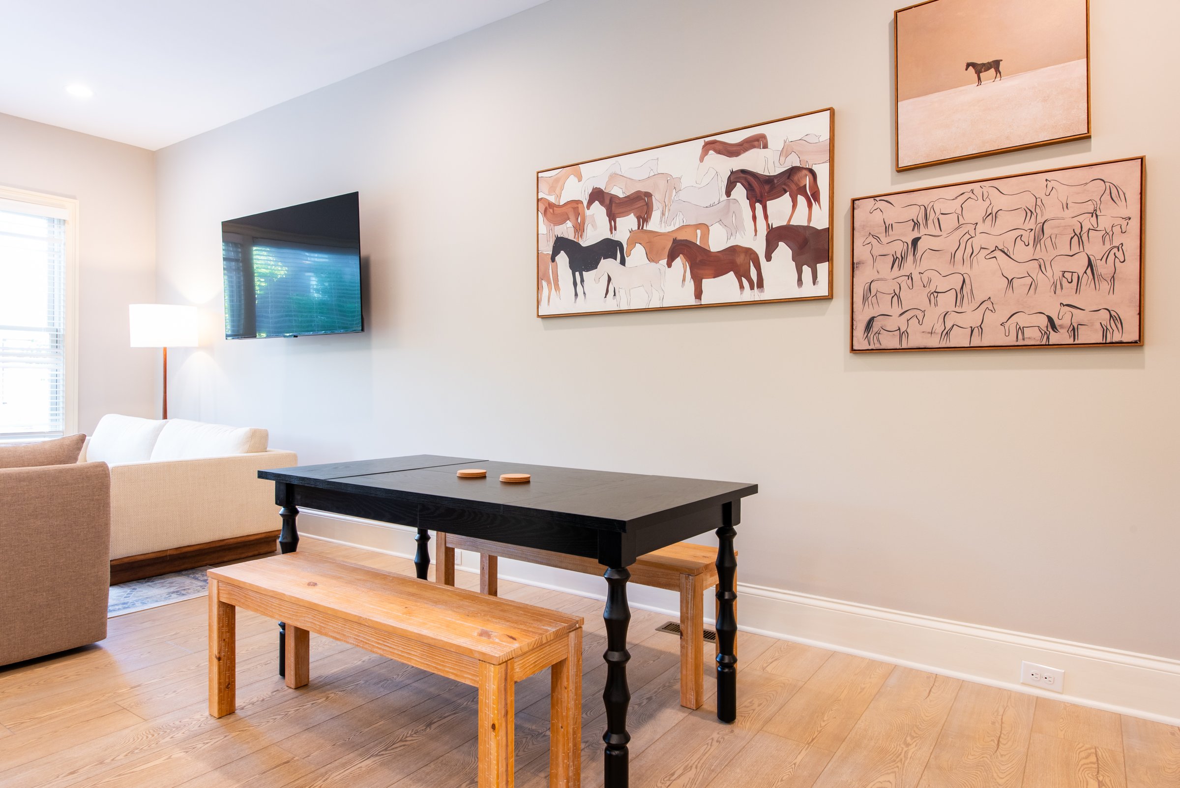 A second dining table seats four to six more, perfect for larger groups.