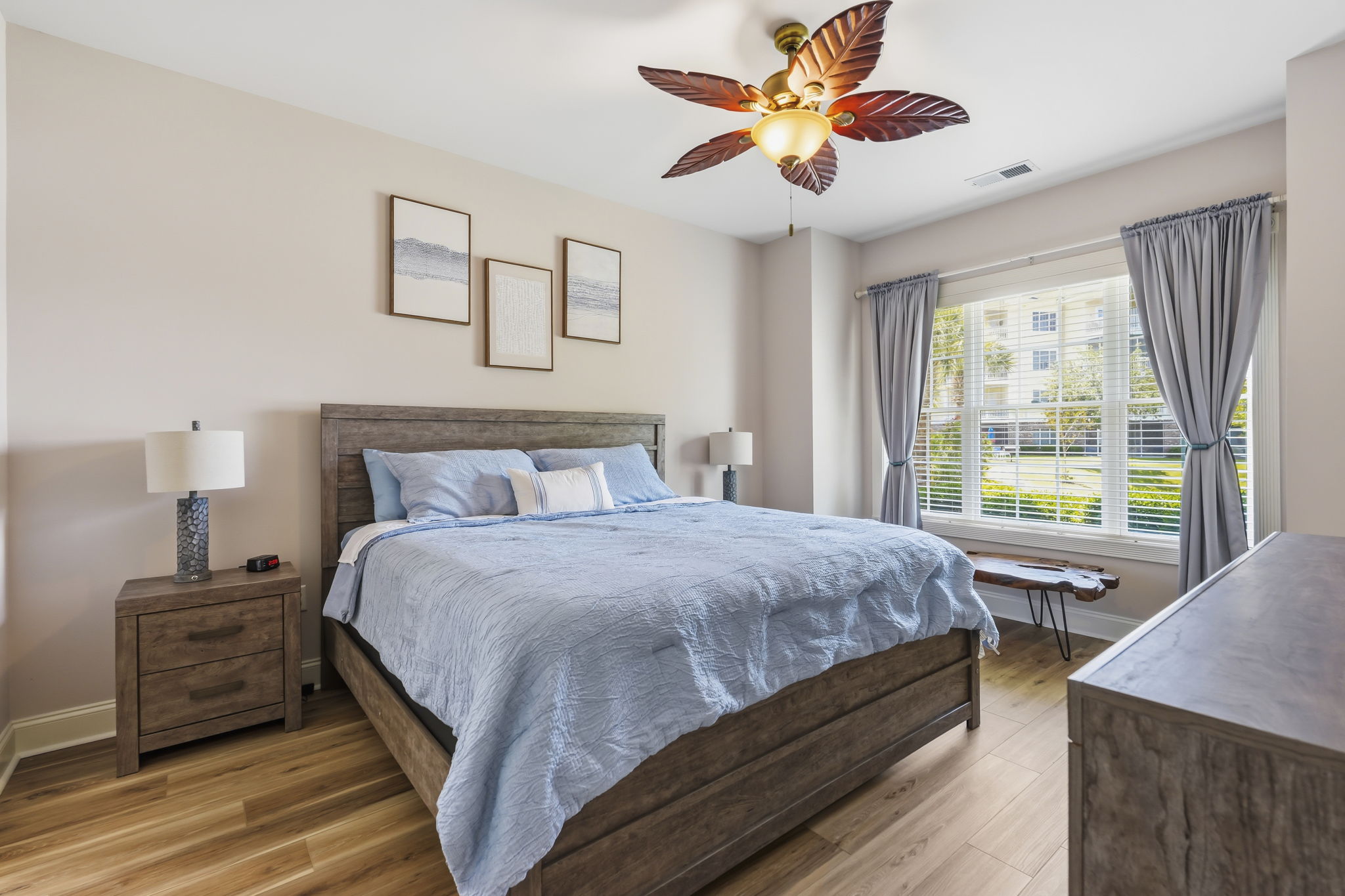 Primary Suite with King bed, ensuite bathroom and view of the lake