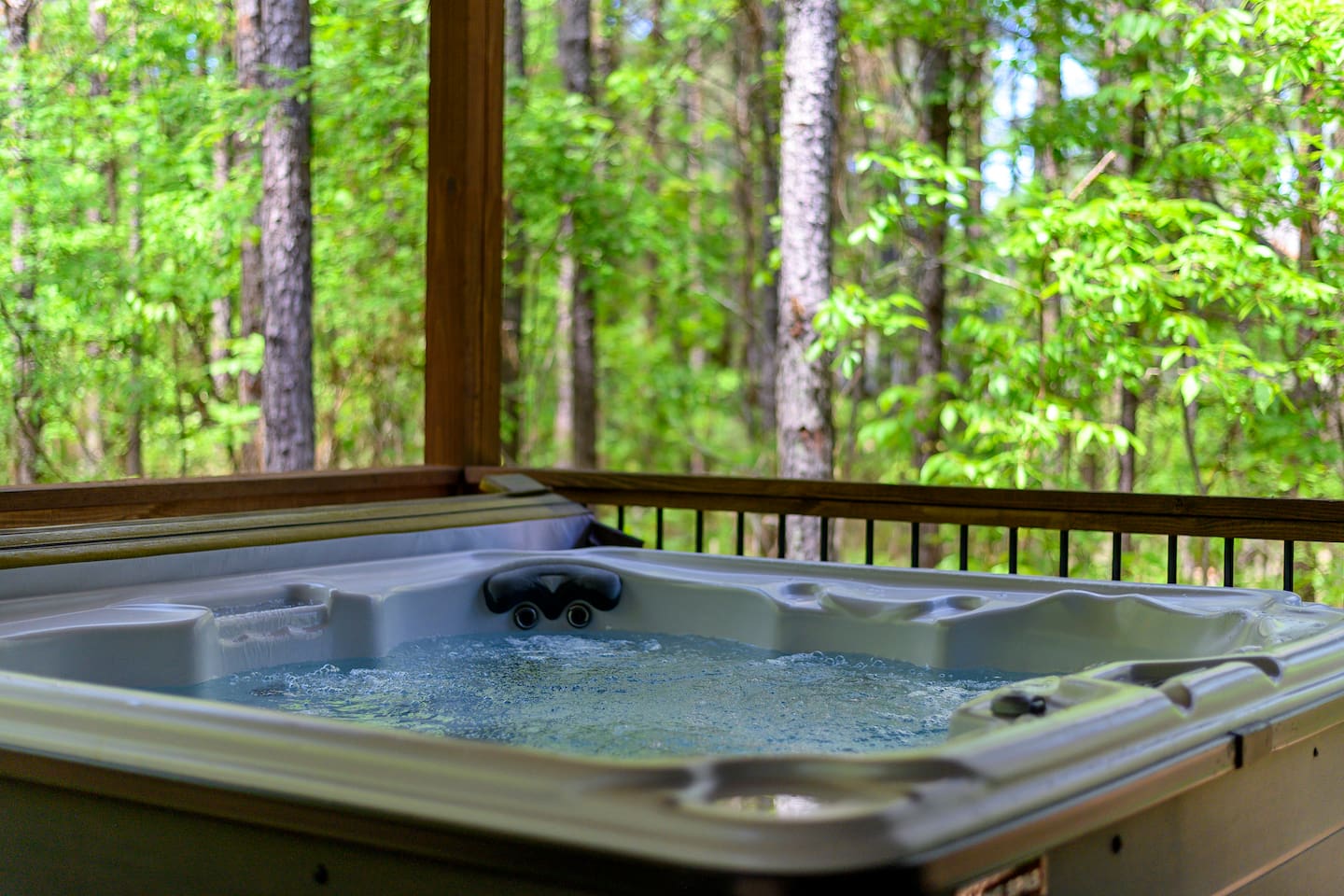 Slip into vacation mode—this bubbling oasis is all yours to enjoy, day or night.