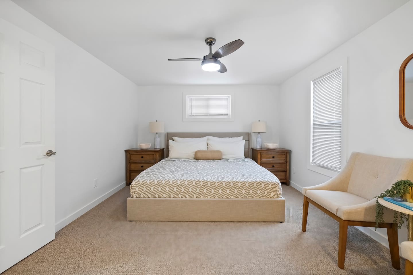 Master bedroom with a king-sized bed.