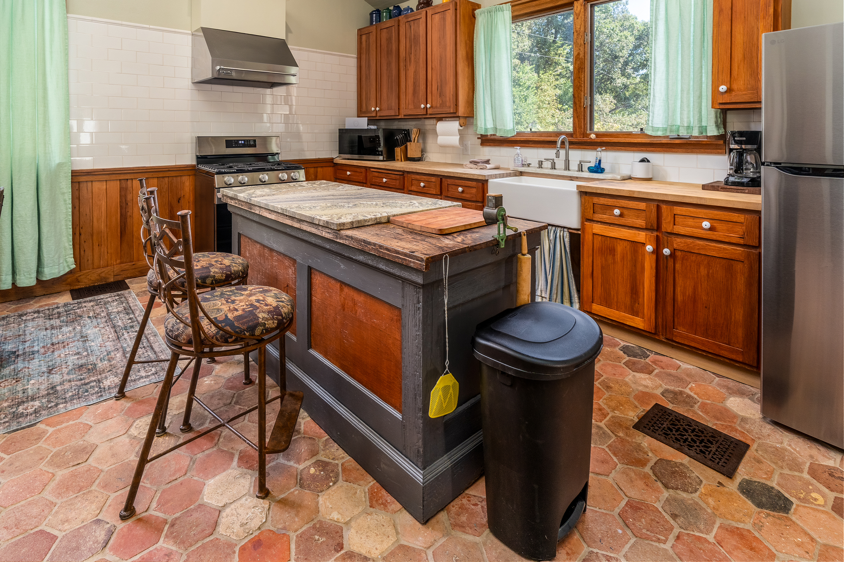 Kitchen island with seating for two, perfect for casual meals or morning coffee.