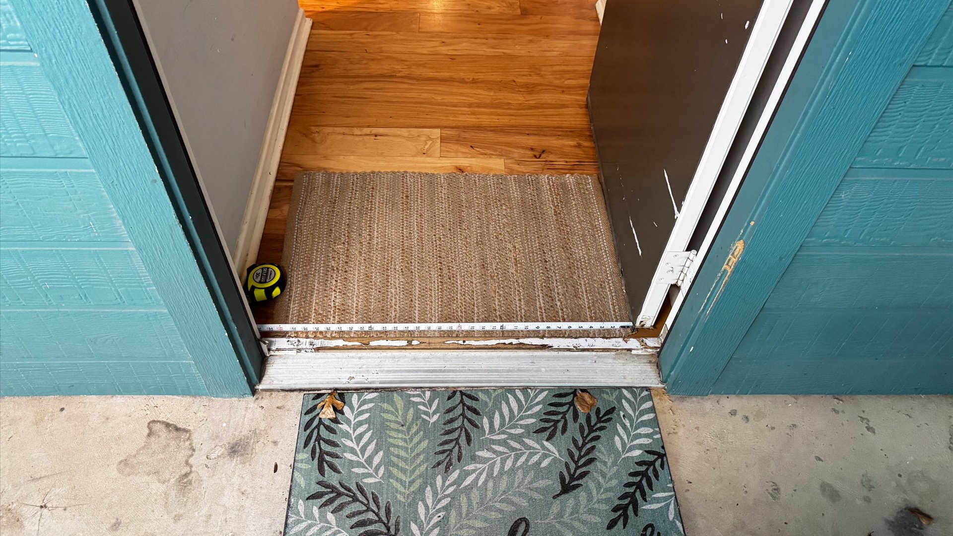 Step free from the carport into the house.