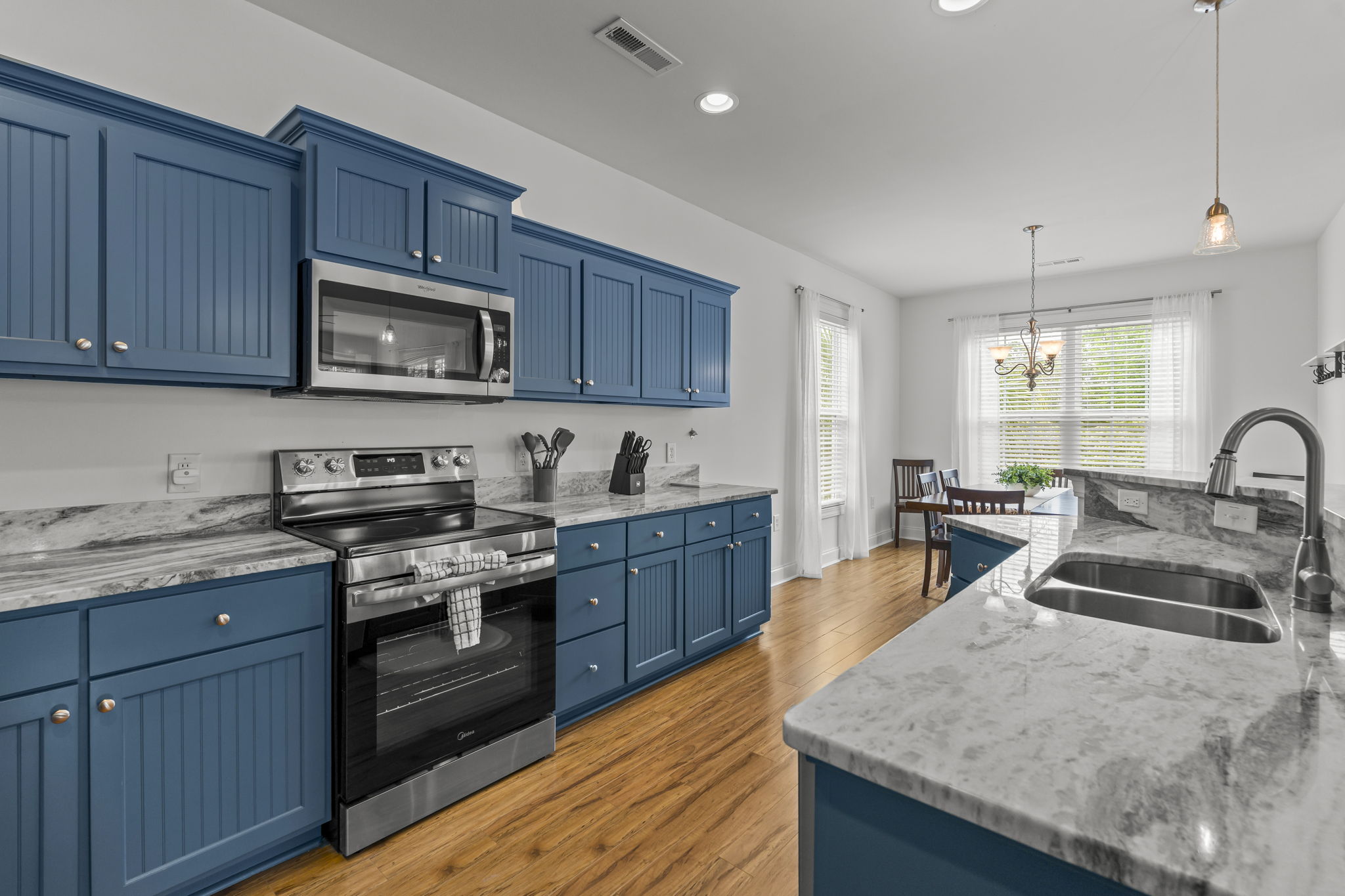 Enjoy cooking in the large kitchen with beautiful granite and stainless steel appliances