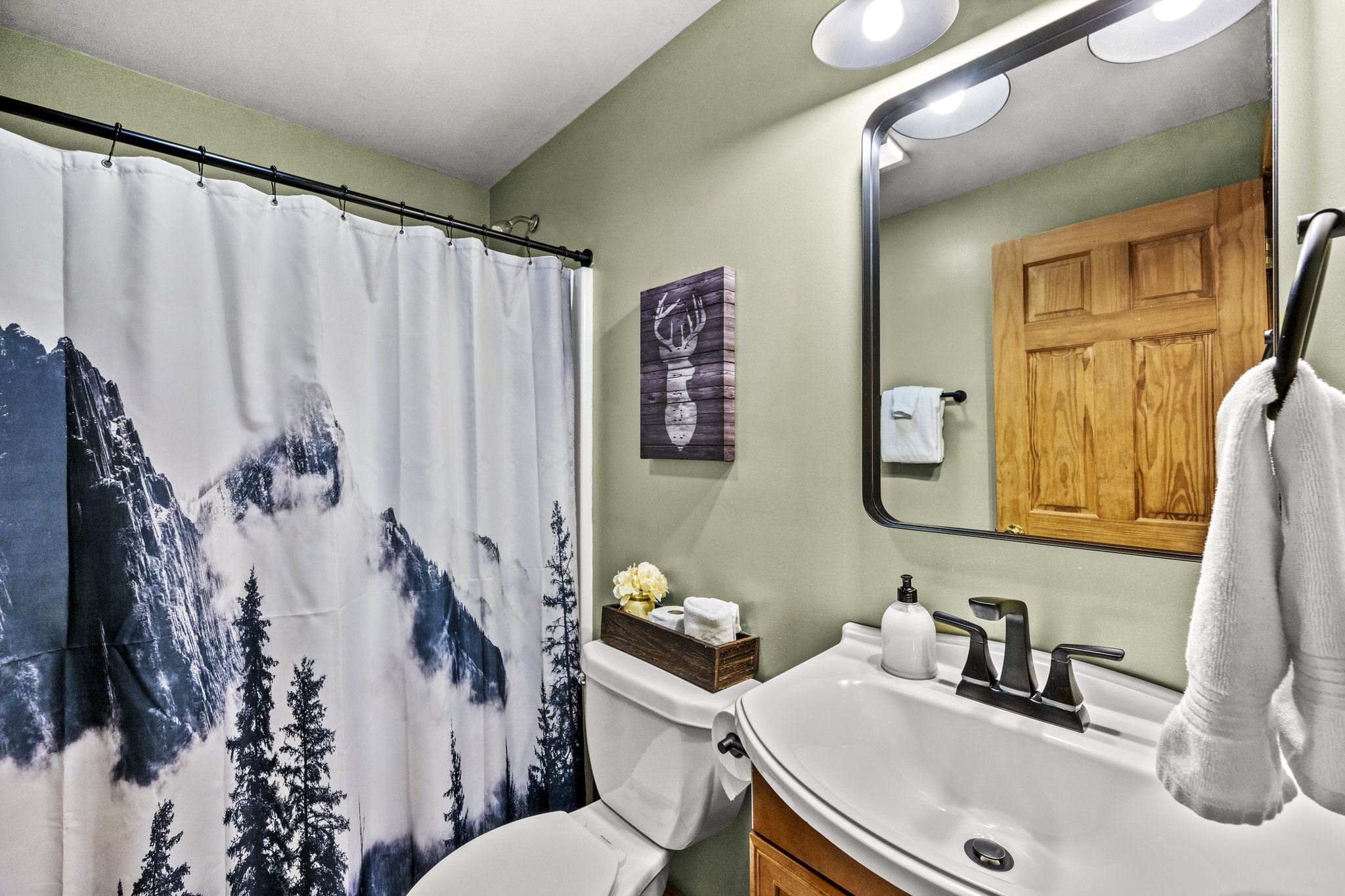 Full bathroom upstairs stocked thoughtfully for your stay.