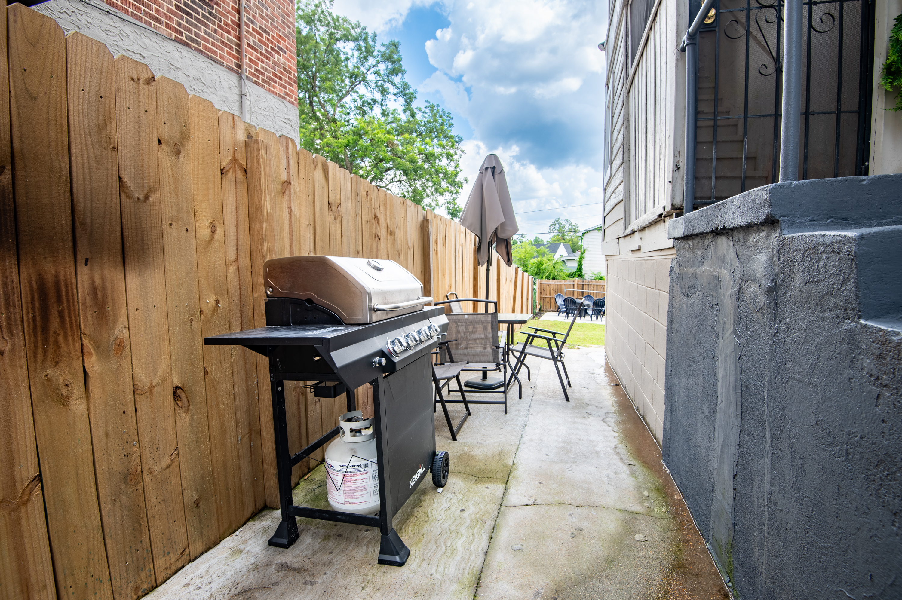 Unit A and B has access to use the grill to the left of the house.