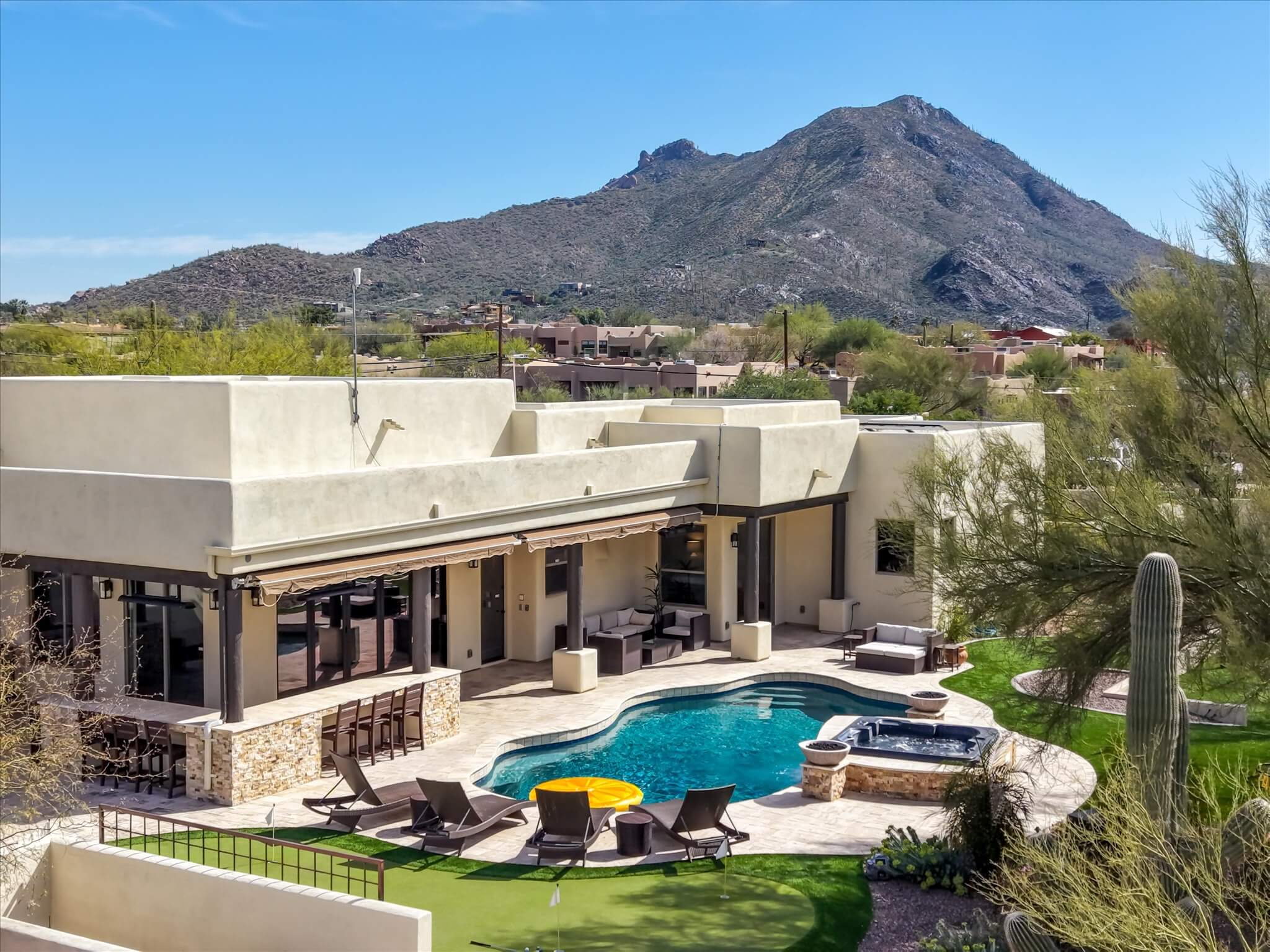 View of the Pool, Hot Tub, Exterior Kitchen / Bar & Mountains