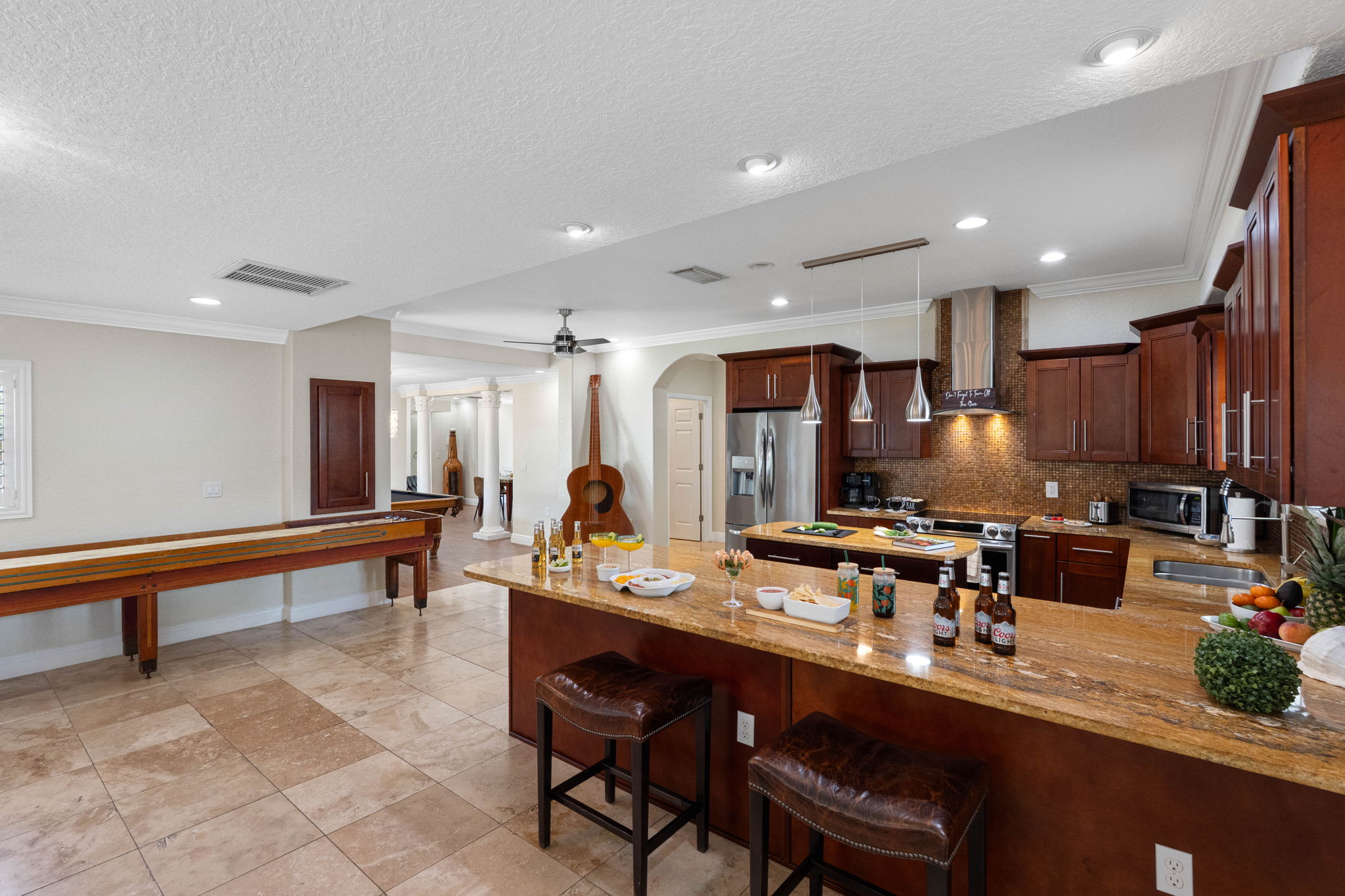 Outfitted with modern appliances, generous counter space, and an open layout, this kitchen is ready for both everyday cooking and entertaining.
