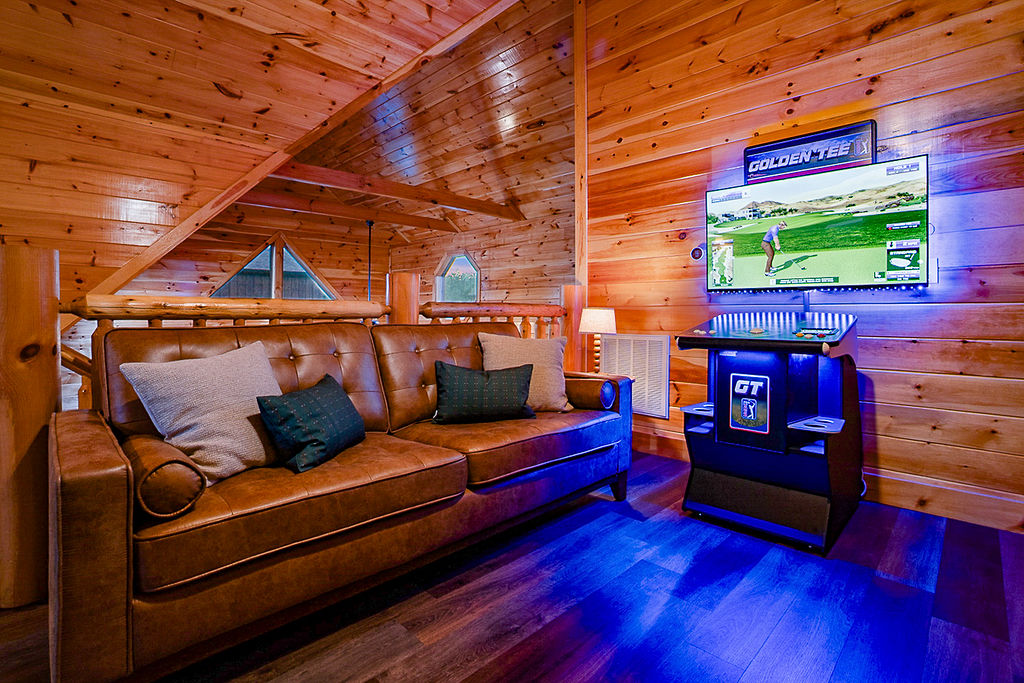 Plush seating in the game room upstairs.