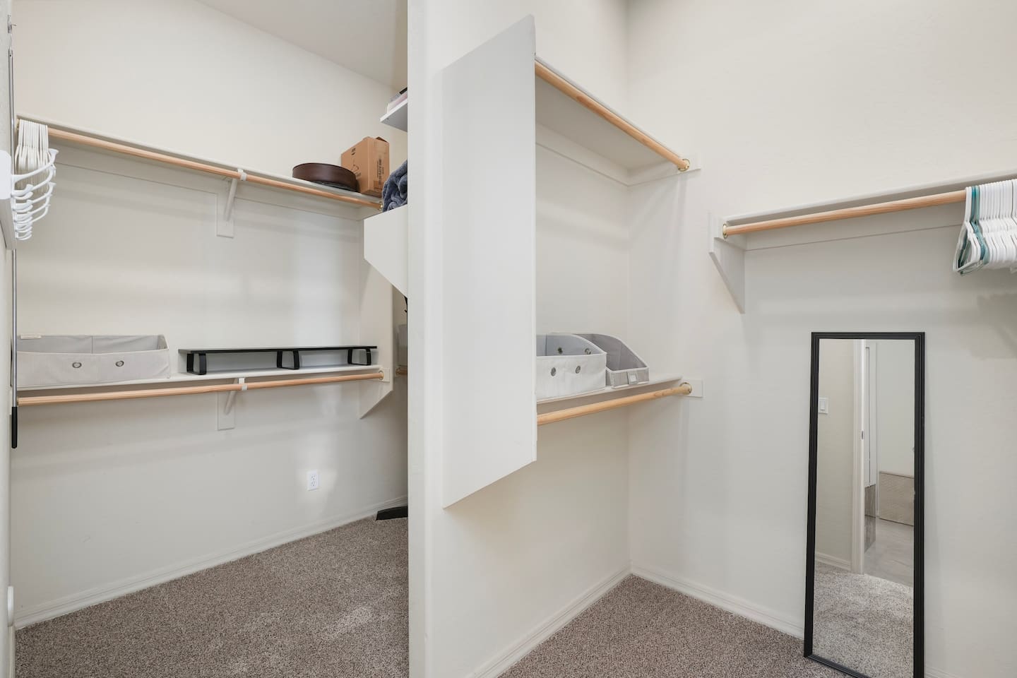 Large walk-in closet offering ample storage space during your stay.