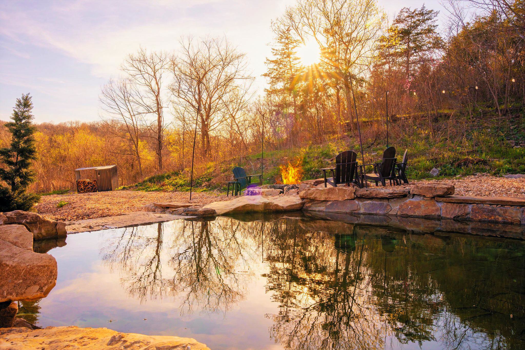 Immerse yourself in your own private Ozark swimming hole. The spring-fed natural grotto pool is filled by the flowing creek waters and incorporates natural stone surroundings and ledges for lounging, relaxing, or floating.