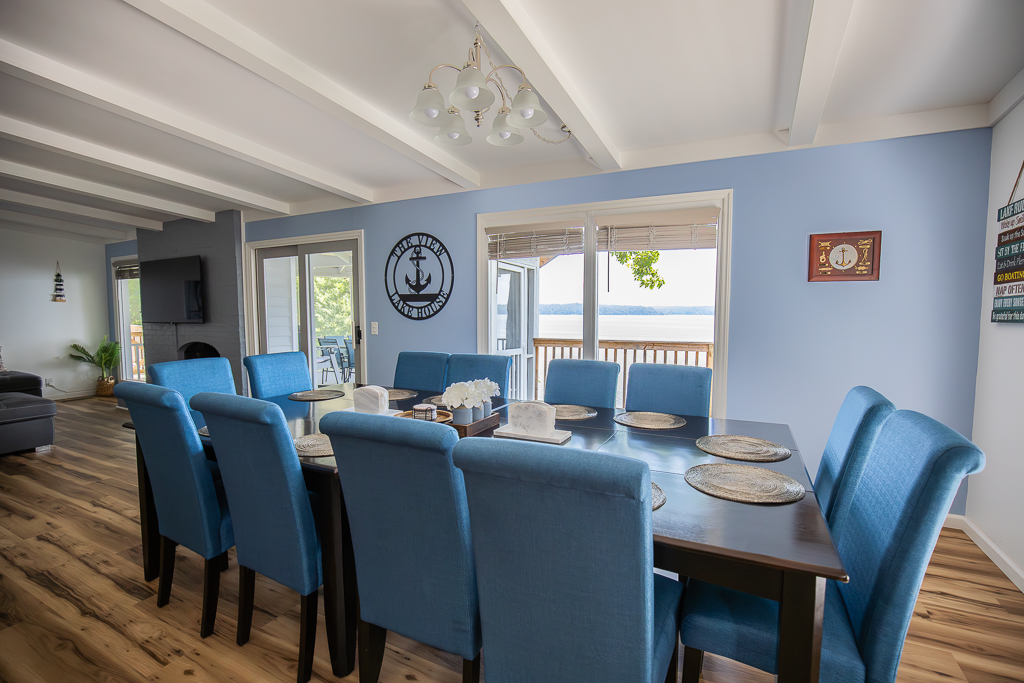 Spacious dining area with seating for the whole group — enjoy meals together with lake views