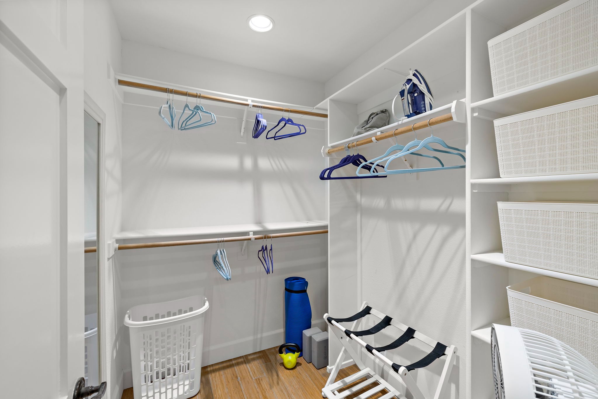 Master Bedroom Closet with plenty of storage, workout equipment and baby gear stored here.