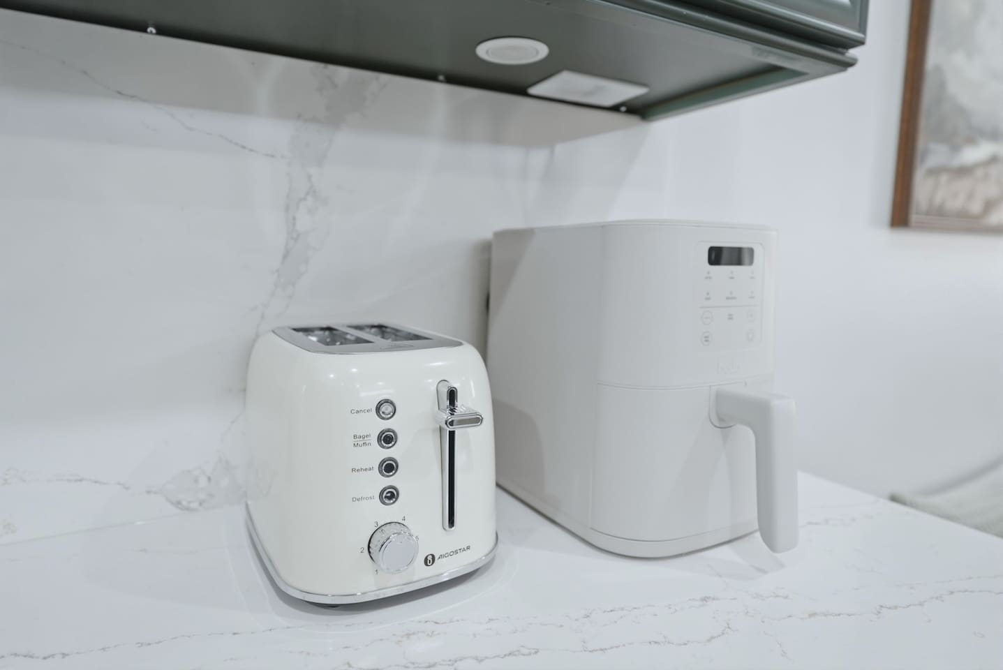 Extra kitchen conveniences including a toaster and air fryer, making quick breakfasts and snacks simple and easy.