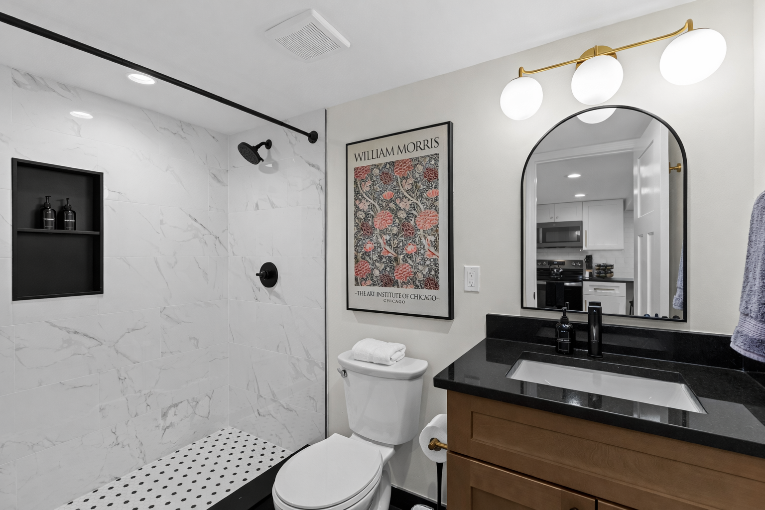 Bright, spa-inspired bathroom with a walk-in tiled shower, modern fixtures, and elegant finishes—designed for a refreshing and relaxing daily routine.