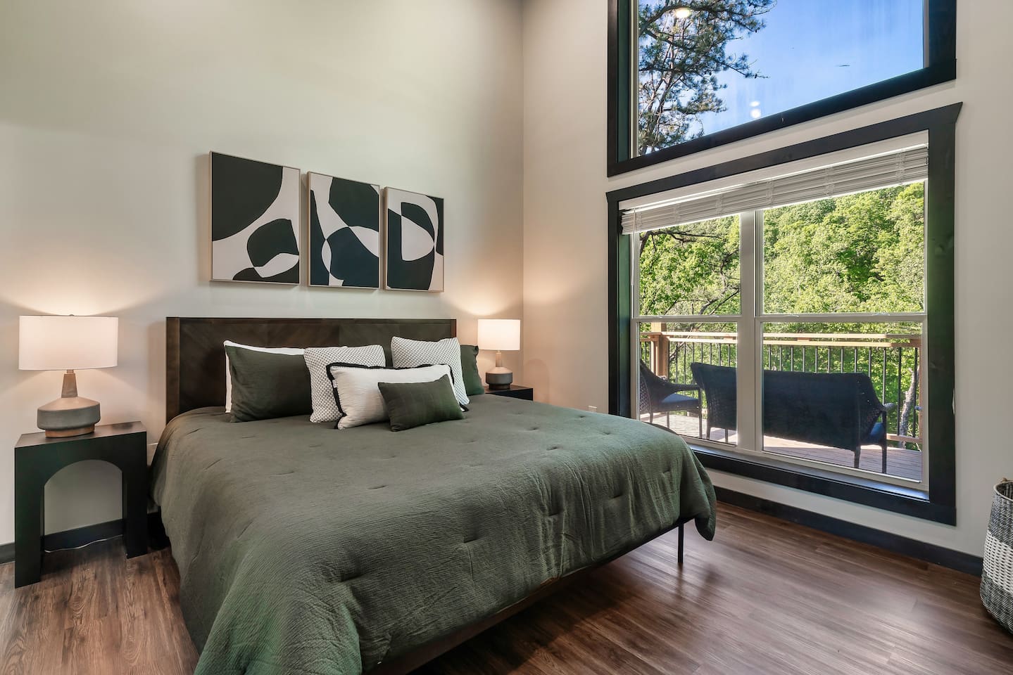 Upper-level king suite with stunning forest views.