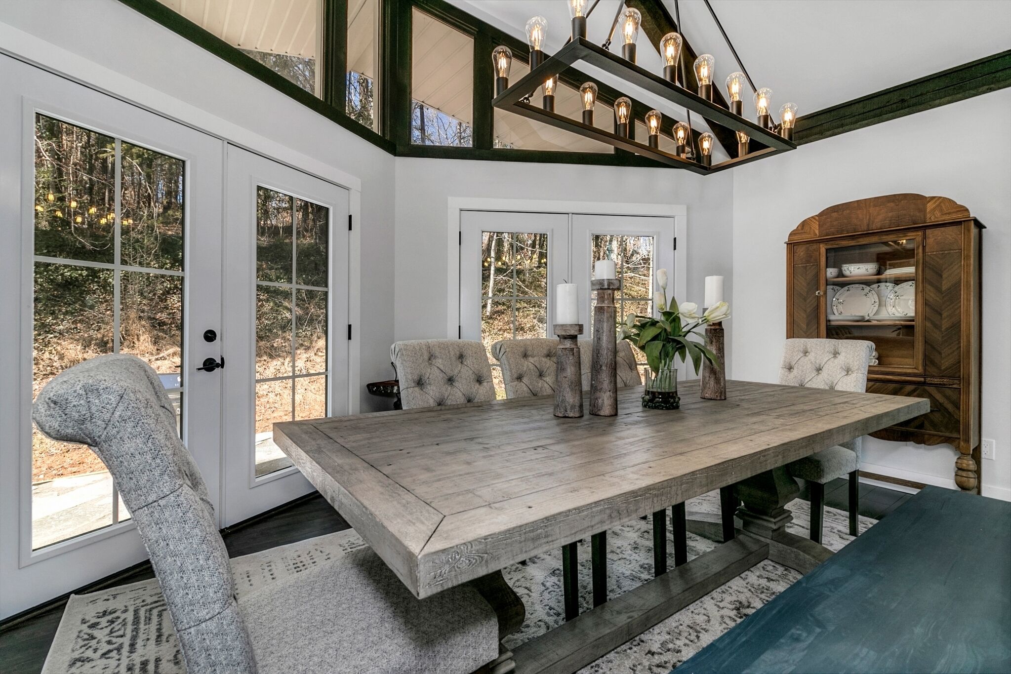 dining area with French doors to back patio