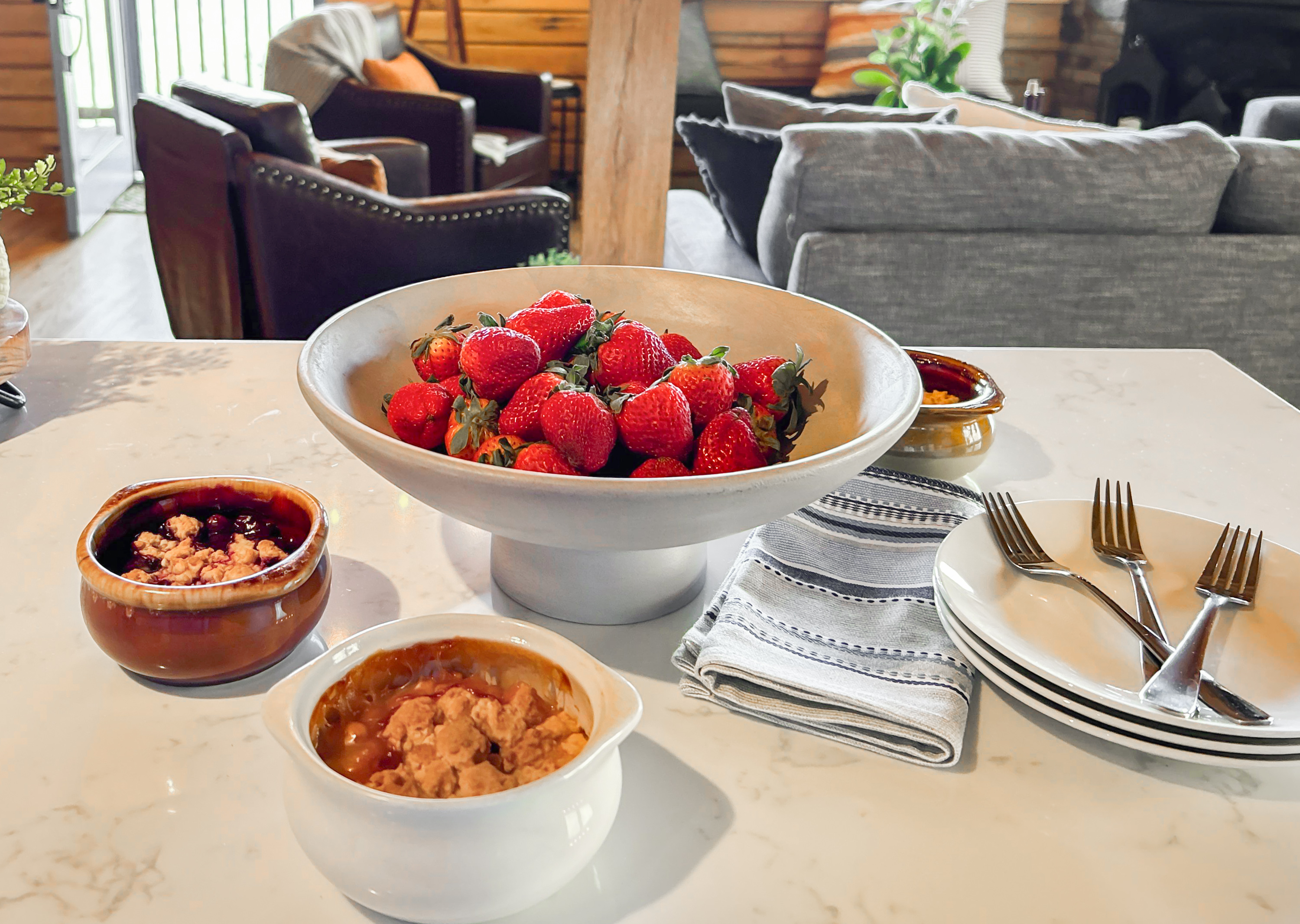 Breakfast is served on the kitchen island.