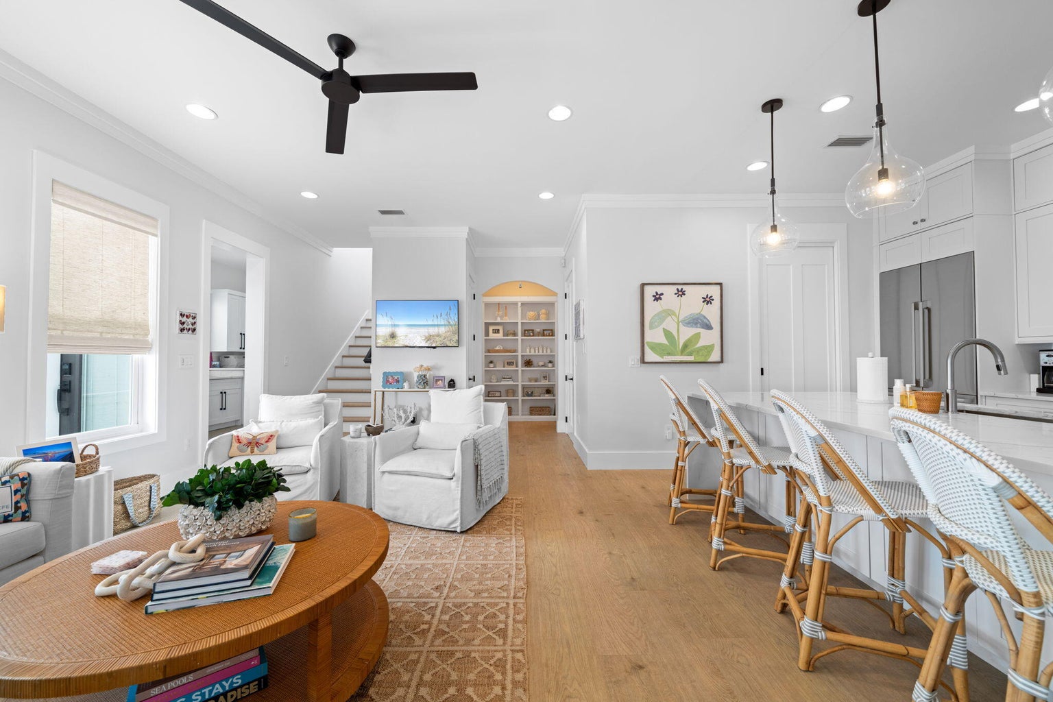 The powder bath is right off the kitchen and living area.